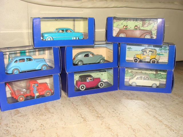 Atlas Tintin - Scale 1/43 - Lot of 8 vehicles of Tintin: 1x Chevrolet, 4x Ford, 1x MG, 1x Lancia & 1x Coupe Spider