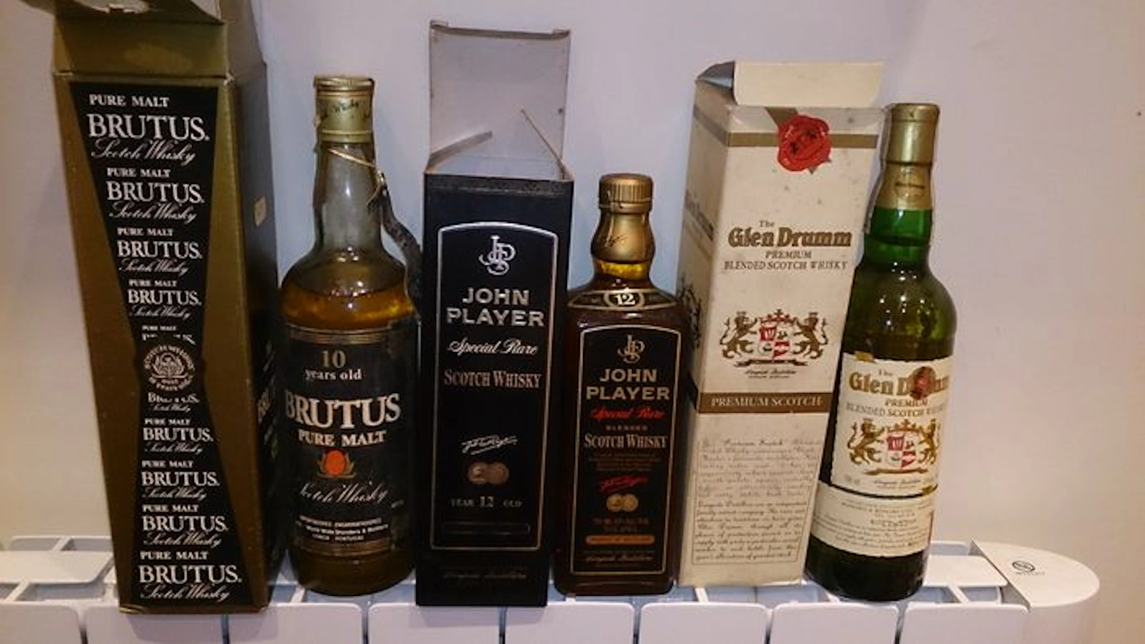 3 bottles of whisky: Brutus, John Player Special & Glen Drumm