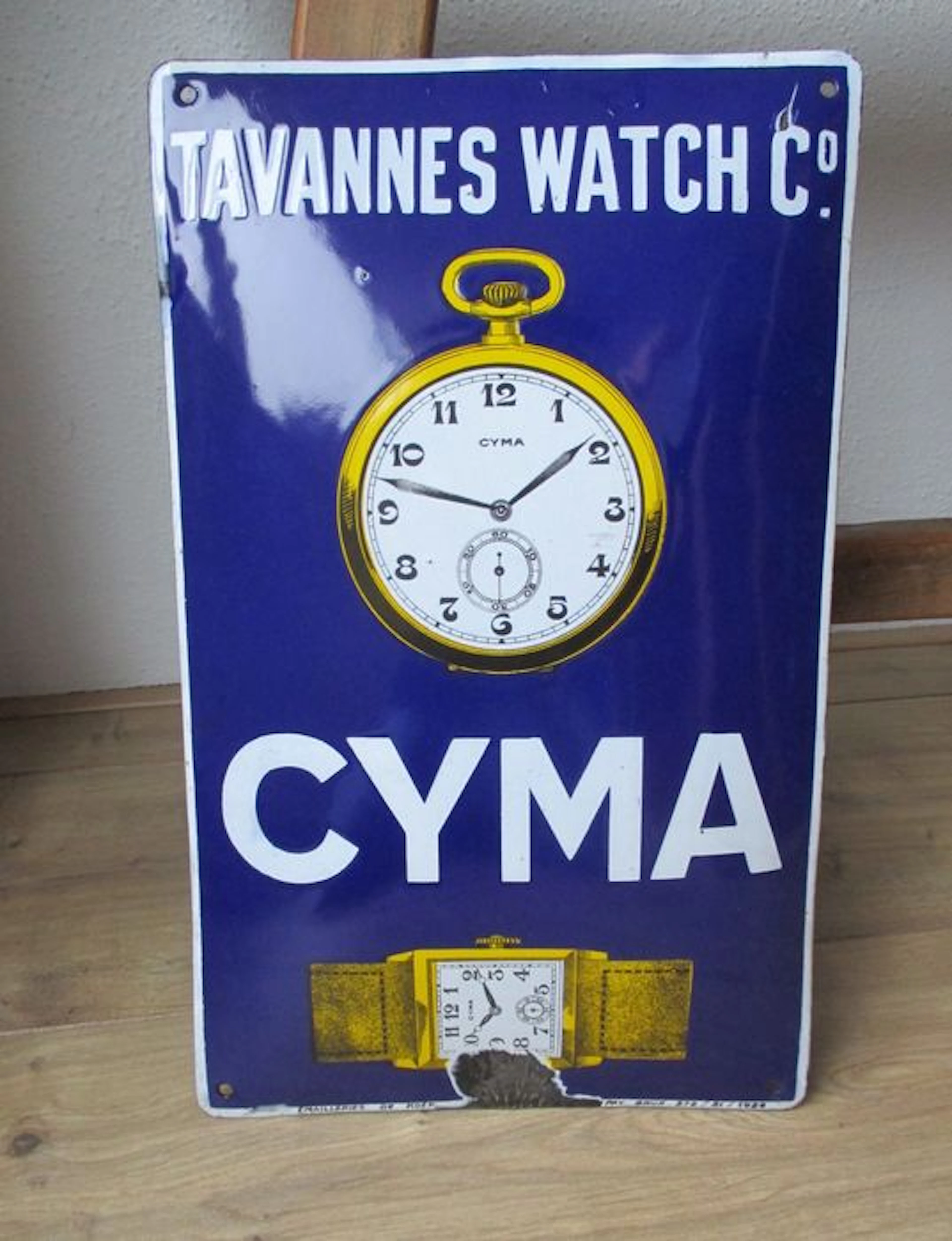 Enamel advertising sign for Cyma Tavannes Watch Co. - 1926
