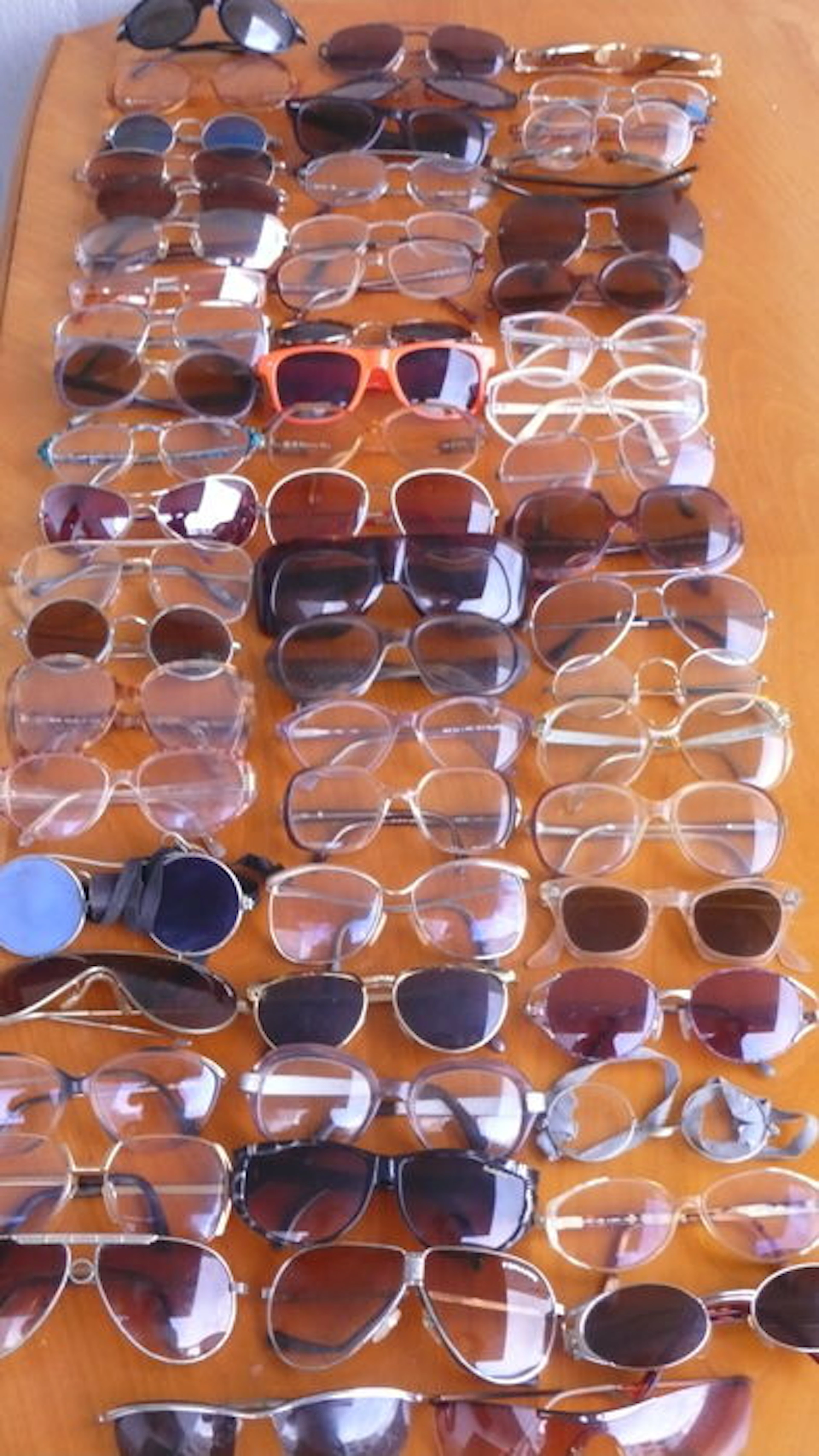 Eyewear collection lot with 60 vintage spectacles