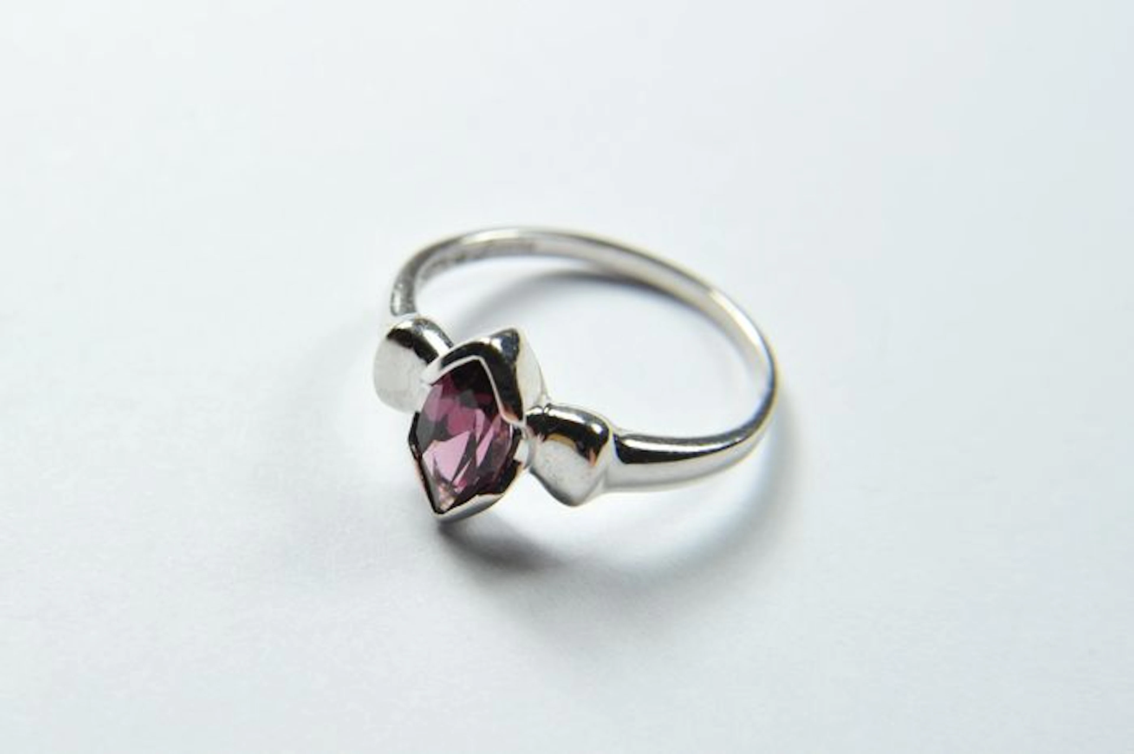 Gold ring with marquise-cut rhodolith