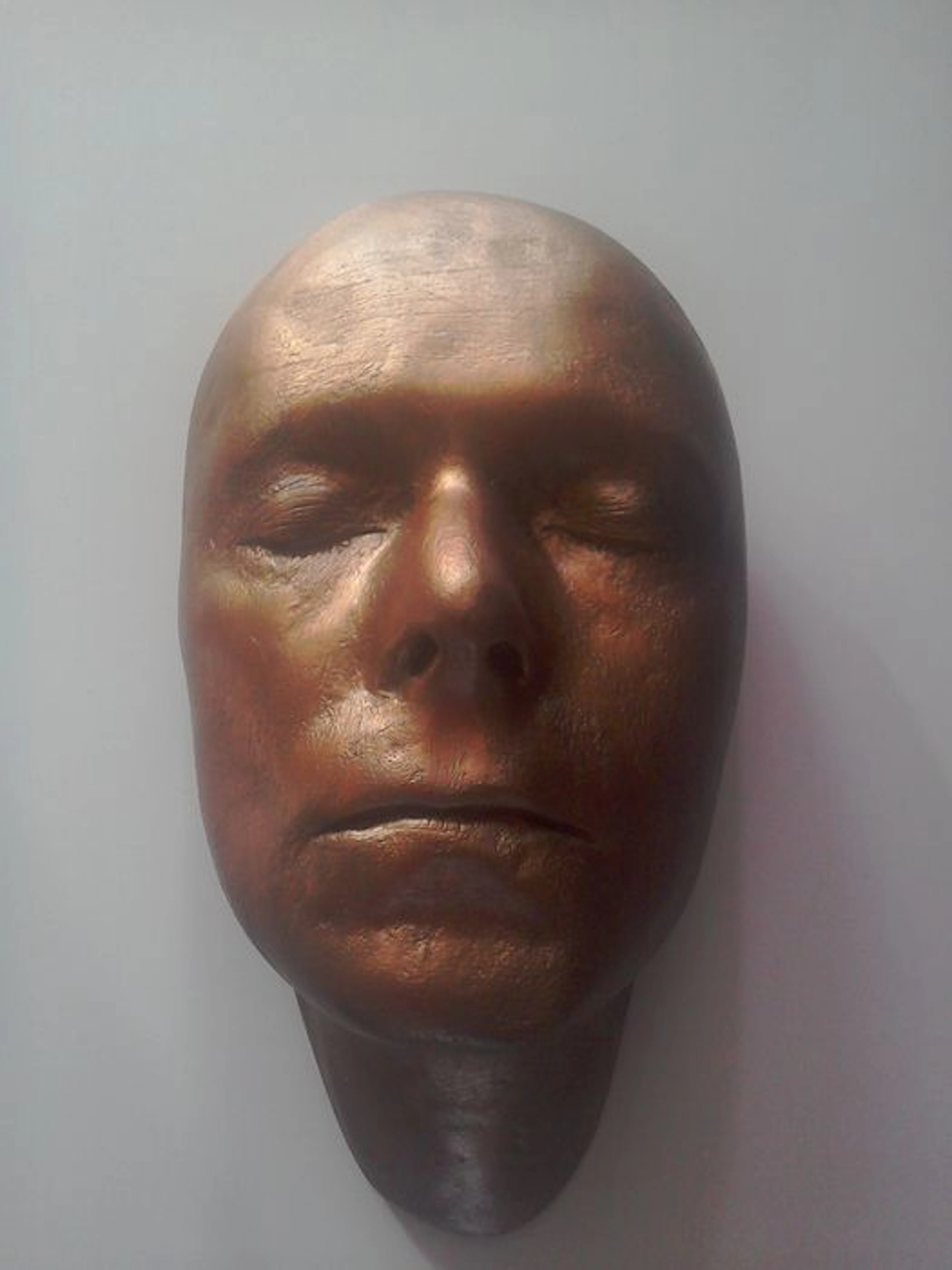 David Bowie Life Size Face Mask In Plaster Finished In Bronze Colour.