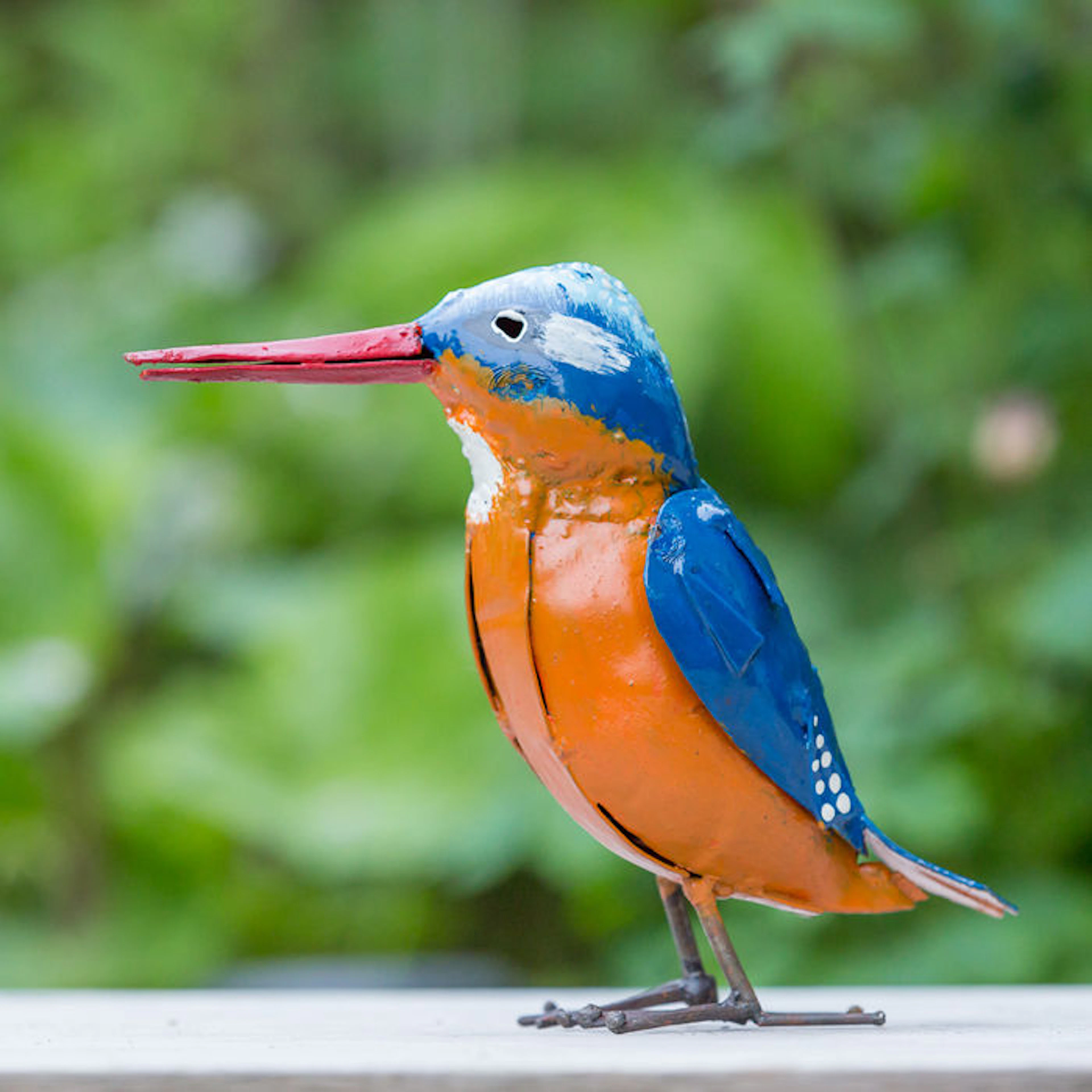 Sculpture of a metal Kingfisher