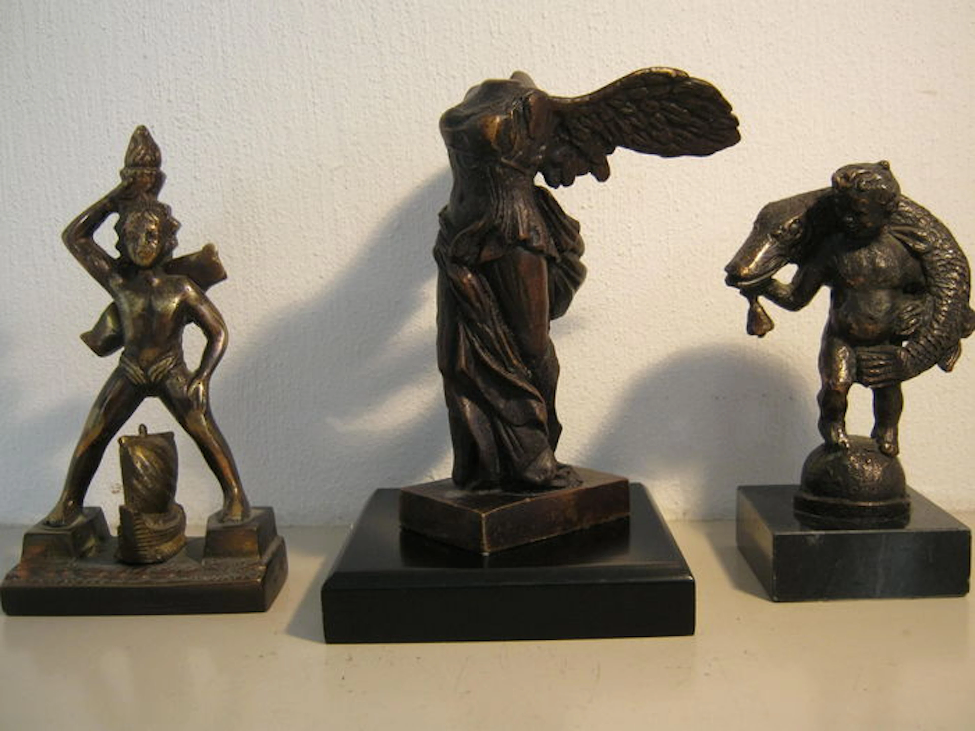 Lot of three bronze/bronzed sculptures