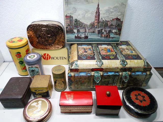 13 old grocery tins
