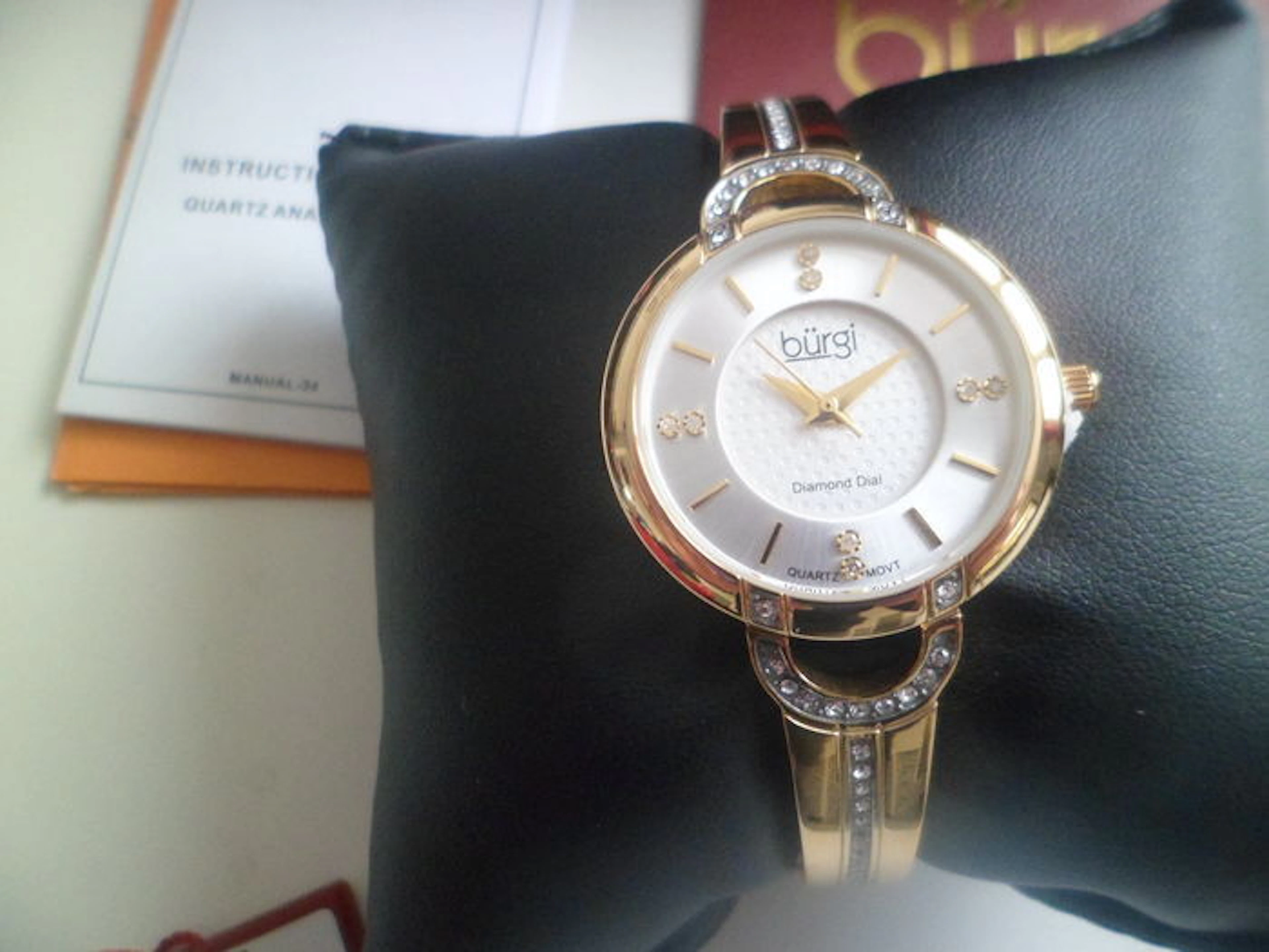 Burgi quartz watch for women, dial set with 8 diamonds and strap with links set with crystals