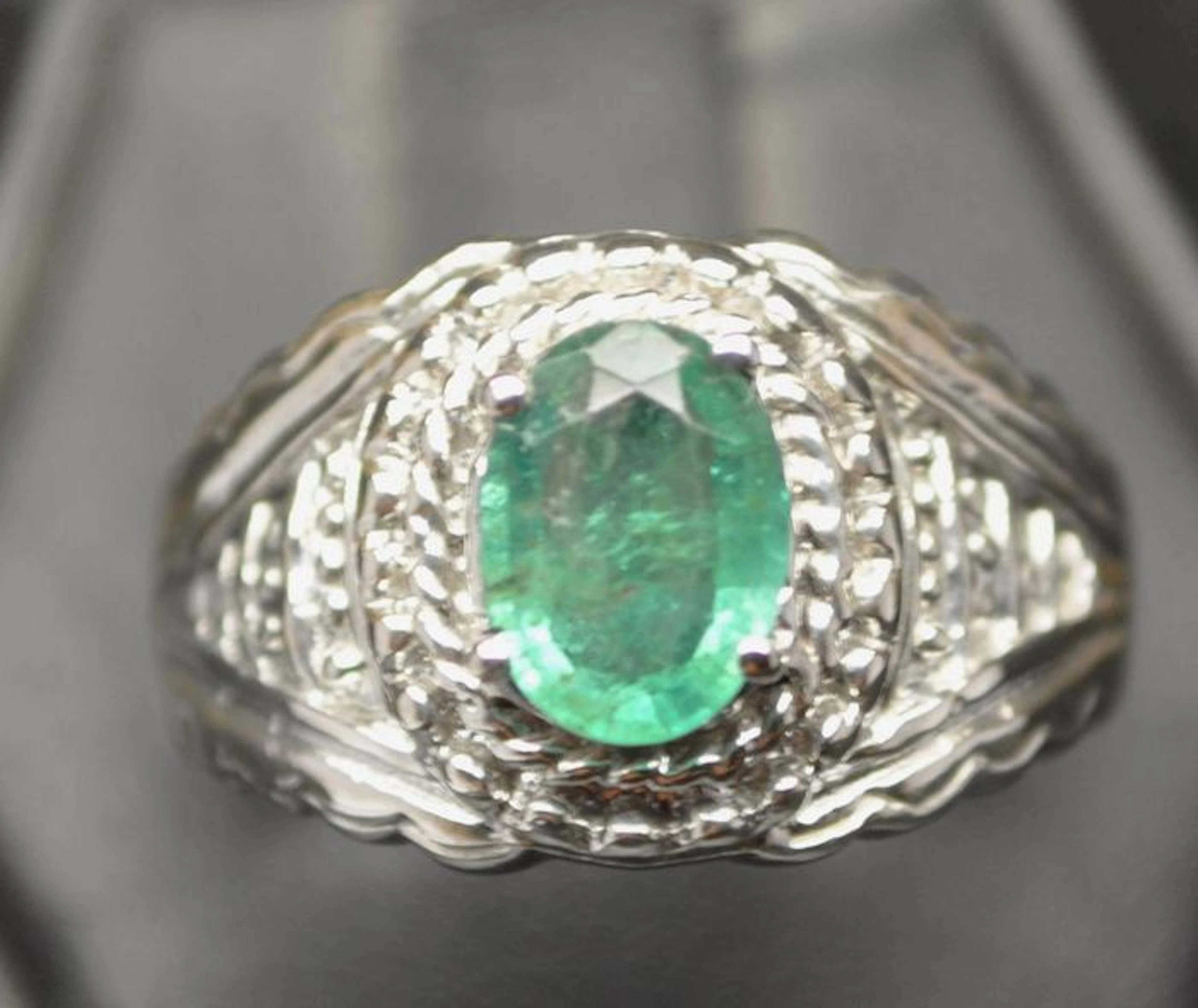 Fine genuine mined from the earth neon green colombian emerald set in a retro style sterling silver mens ring