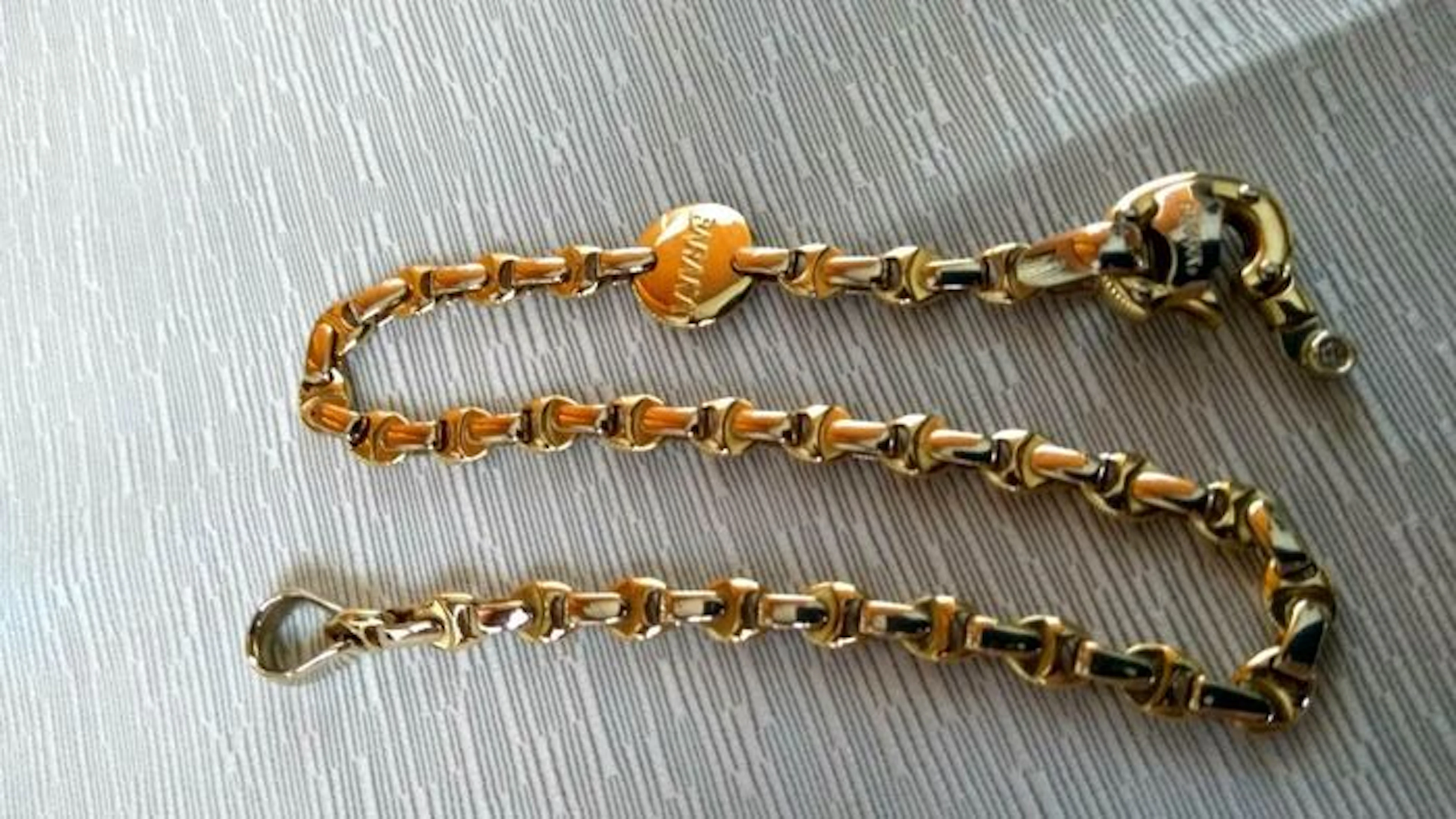 Men's bracelet in 18 kt yellow gold with a diamond set into one of the chains, colour: G, clarity: IF, weight: 0.02 ct (Brand: Baraka)