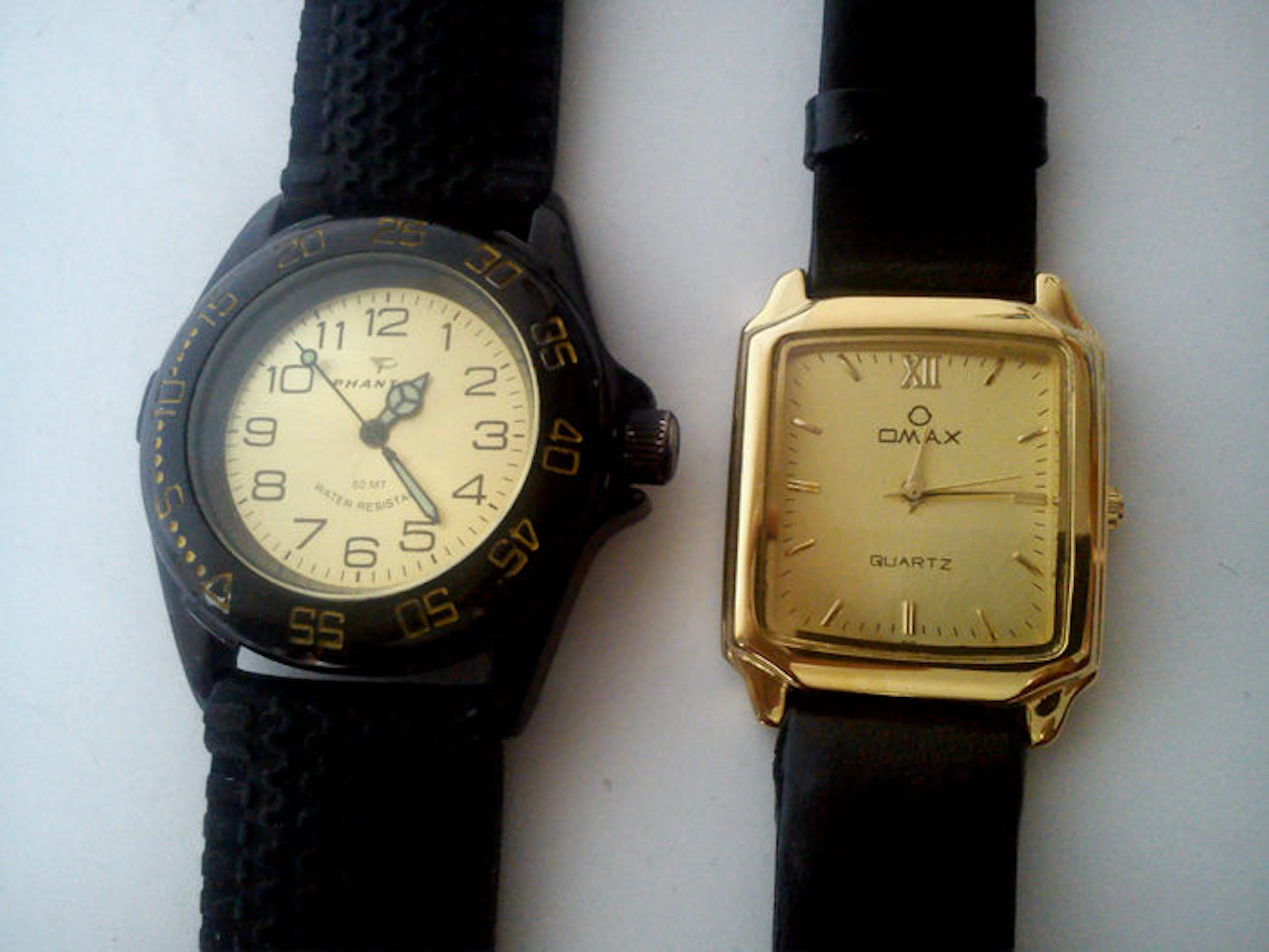 Phantom; Omax - Men's wristwatches - 1990s