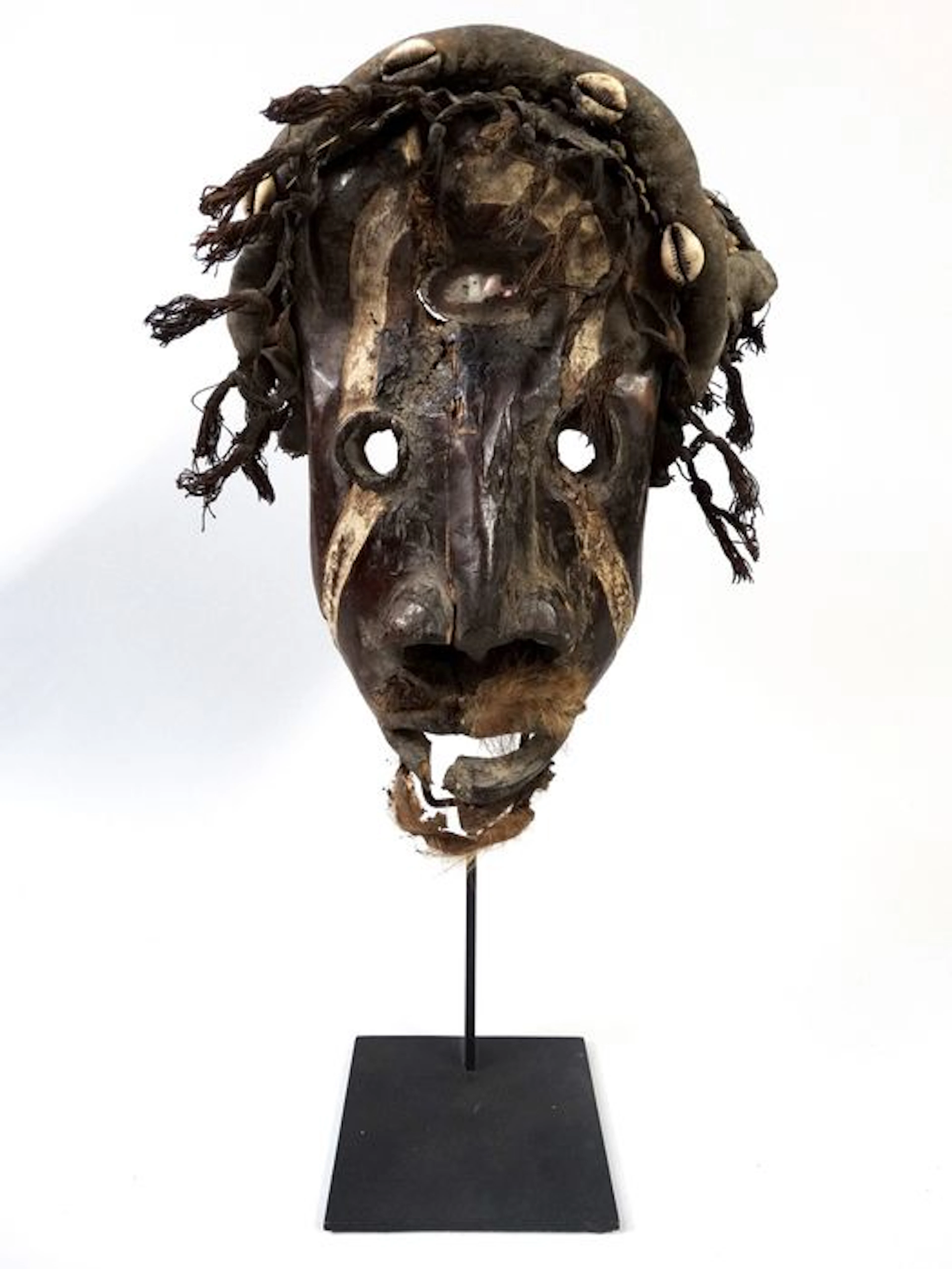 Old African face mask from the DAN tribe in Ivory Coast