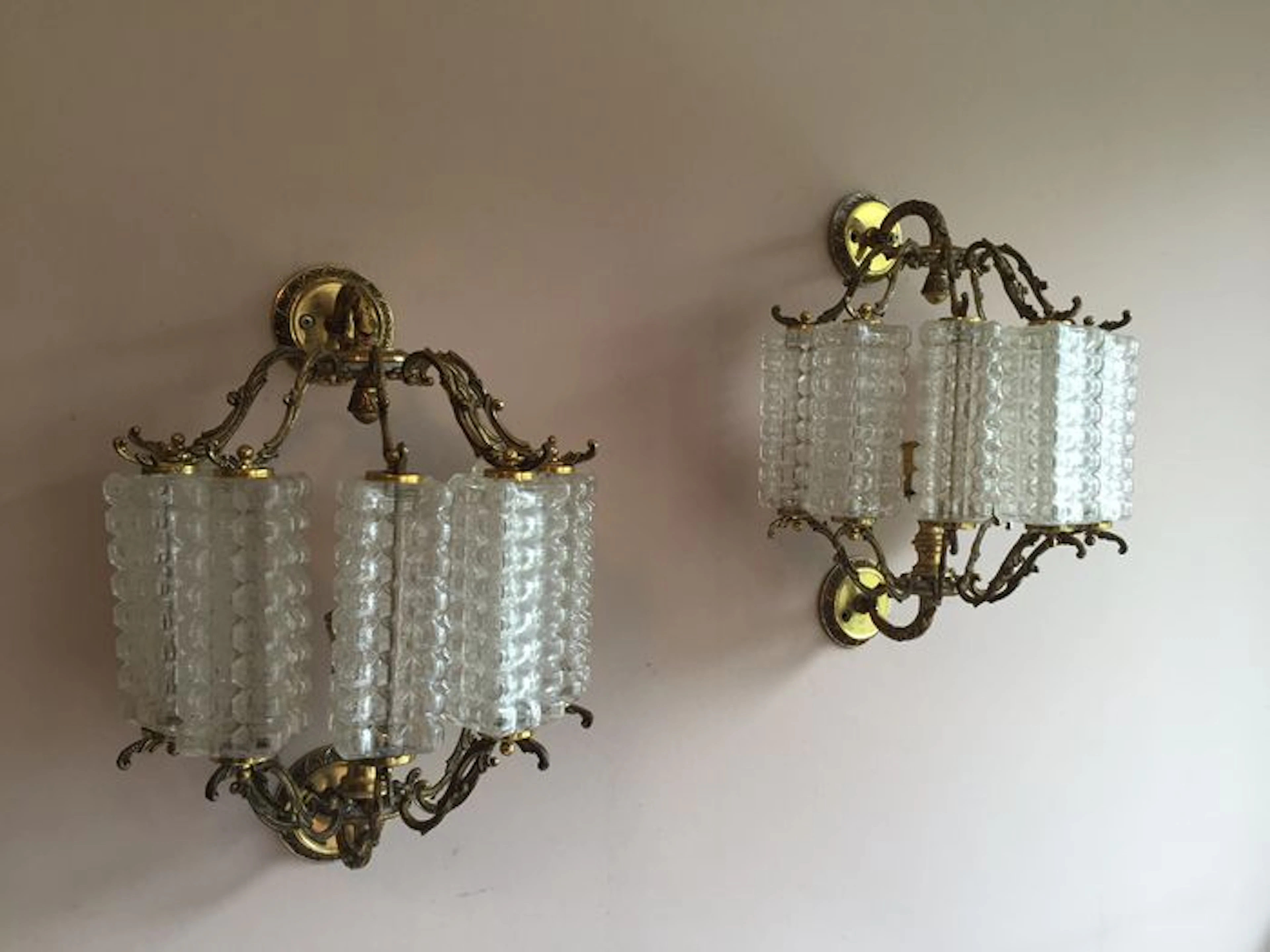 A pair of vintage brass and glass wall appliques, Continental, 1970s