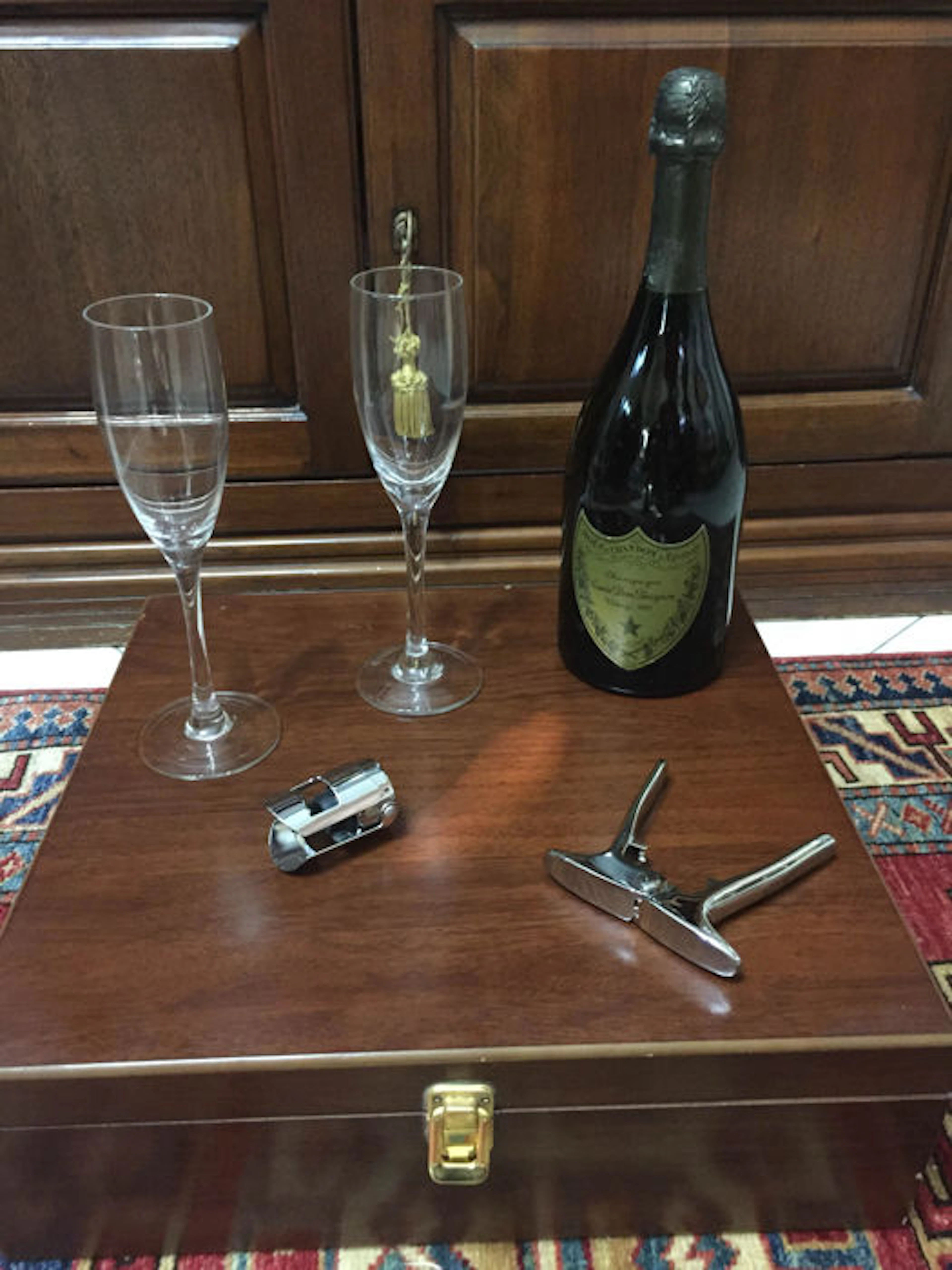 Dom Perignon Champagne Brut, 1970 – Complete with 2 flutes, bottle opener, steel stopper, and wood case.
