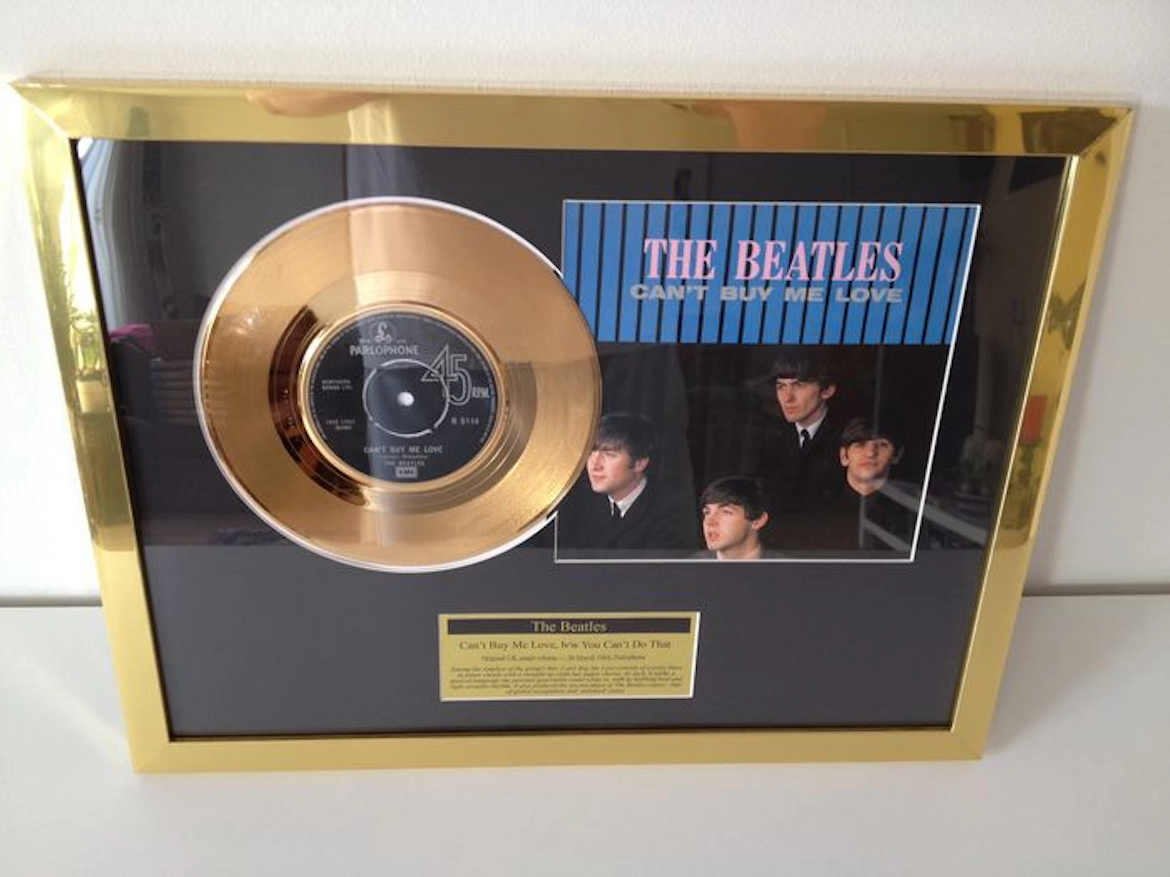 The Beatles Gold Plated Original 7" Record "Can't Buy Me Love" Displayed