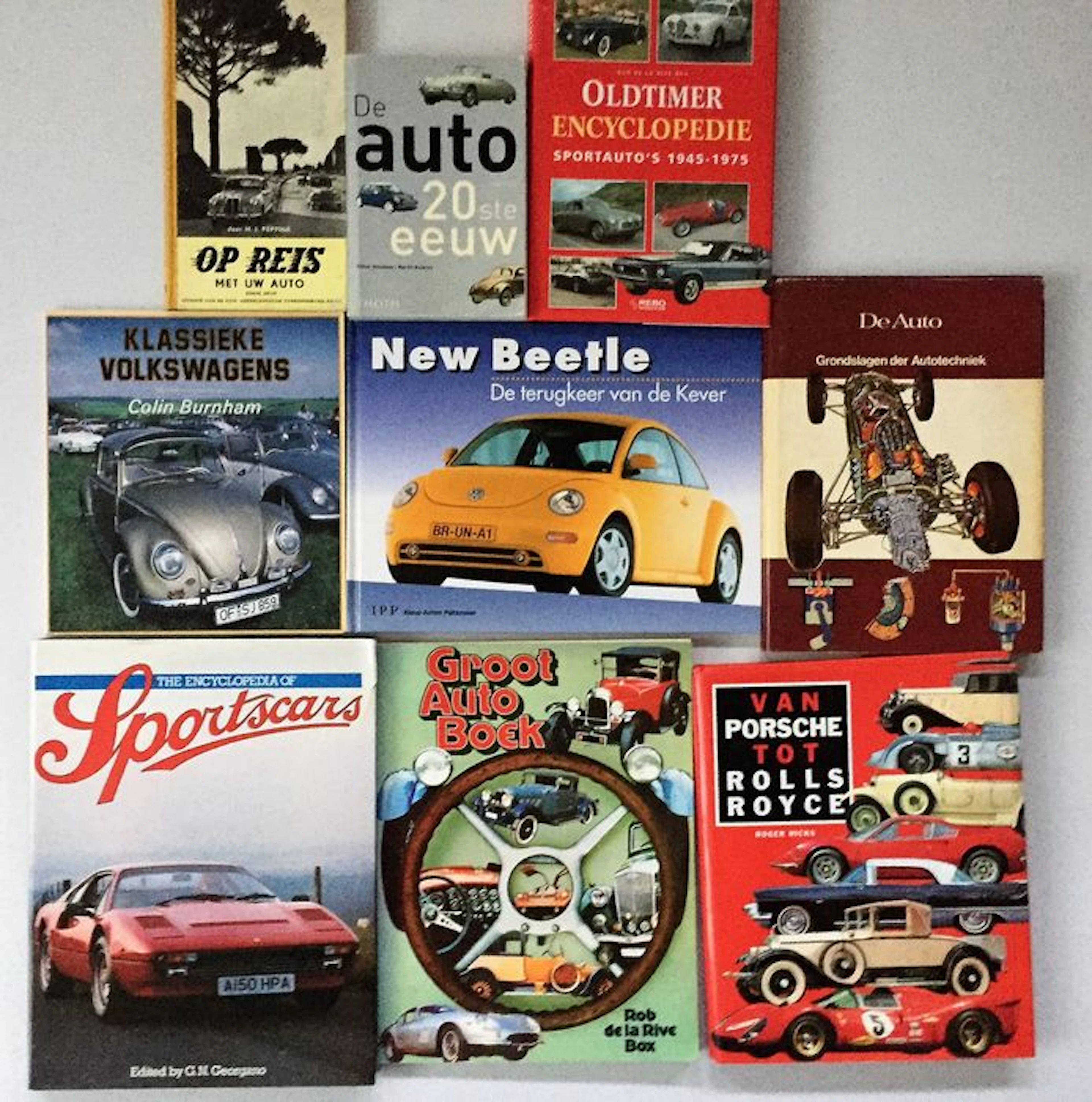 Collection of 9 car books.