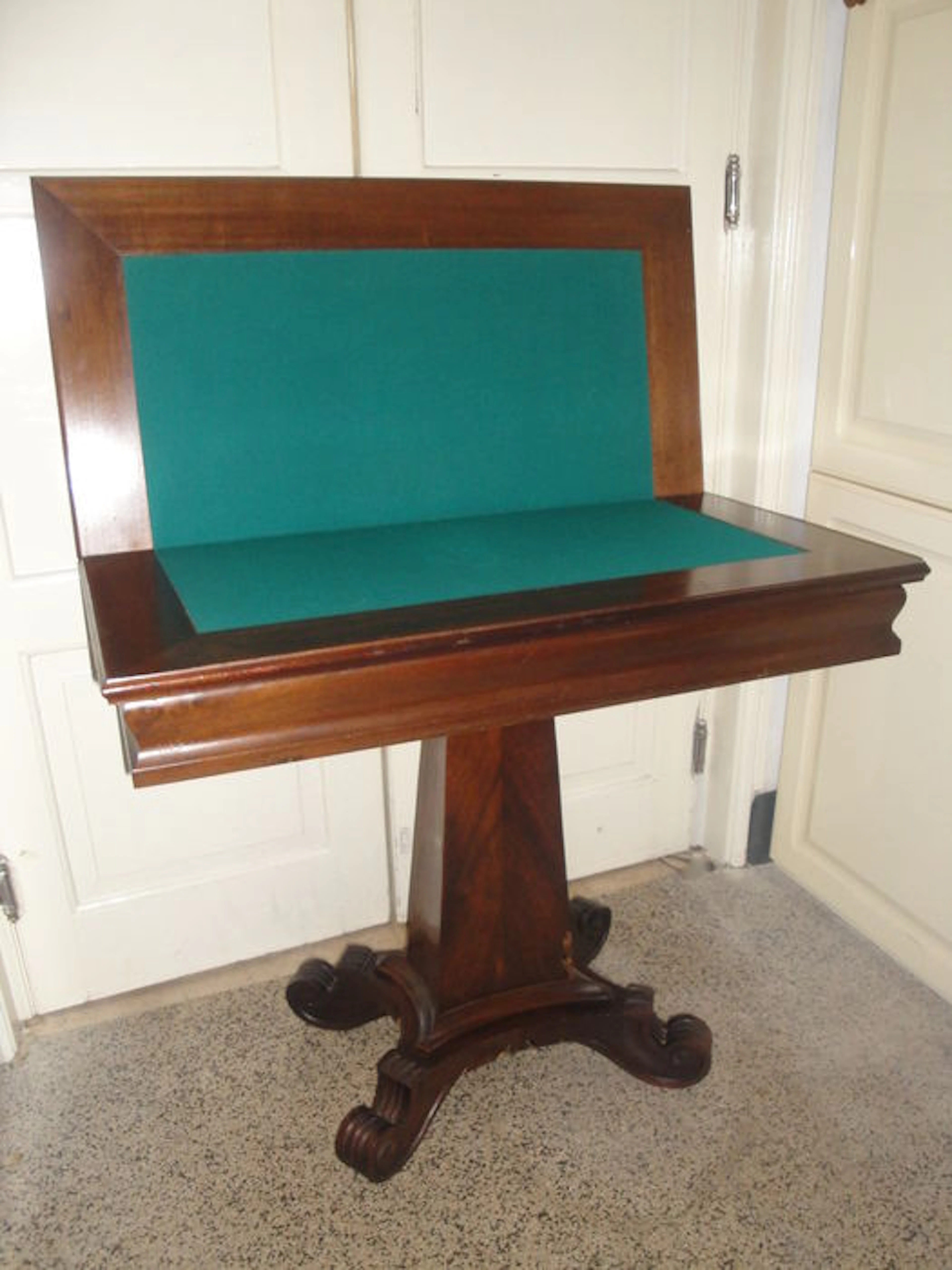 A Solid Magogany Gaming Table with Carved Feet, France, XX century
