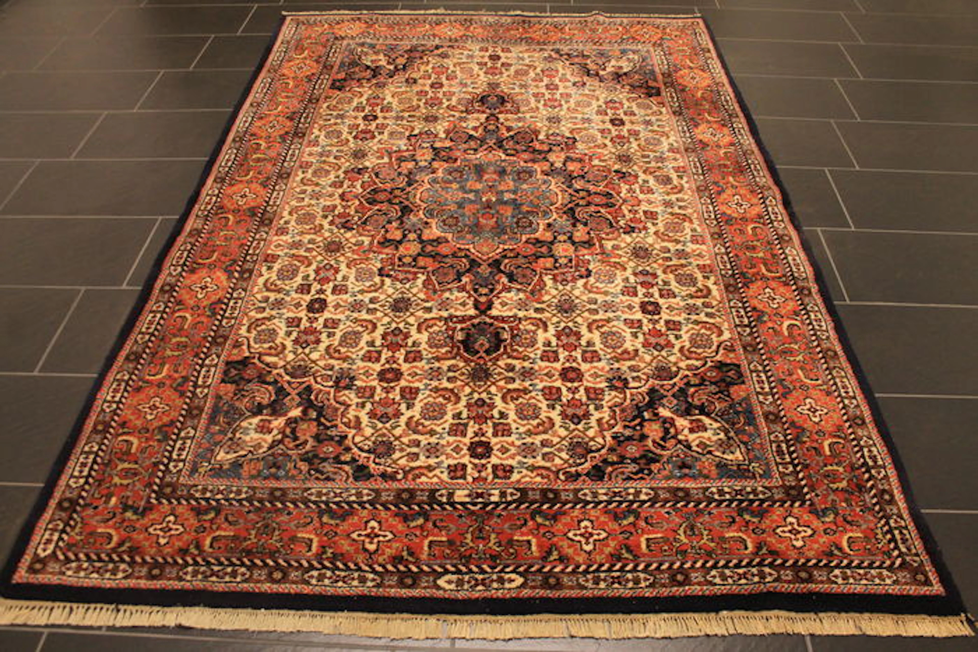A Royal handwoven Persian carpet, Indo Moud Mut medallion, 175 x 255