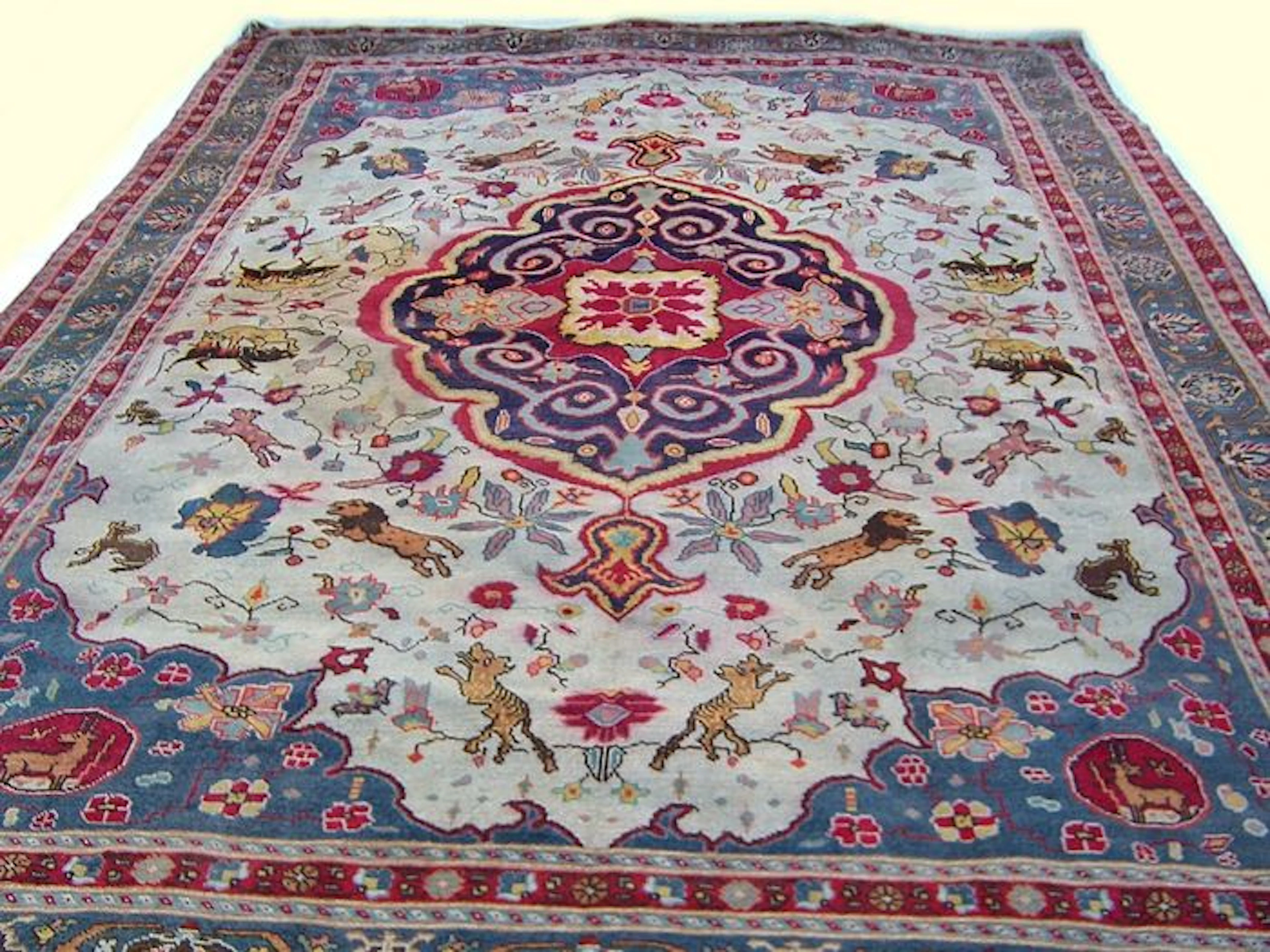 Huge rare hand-knotted with animal figures old carpet Oushak - Turkey / 1930.