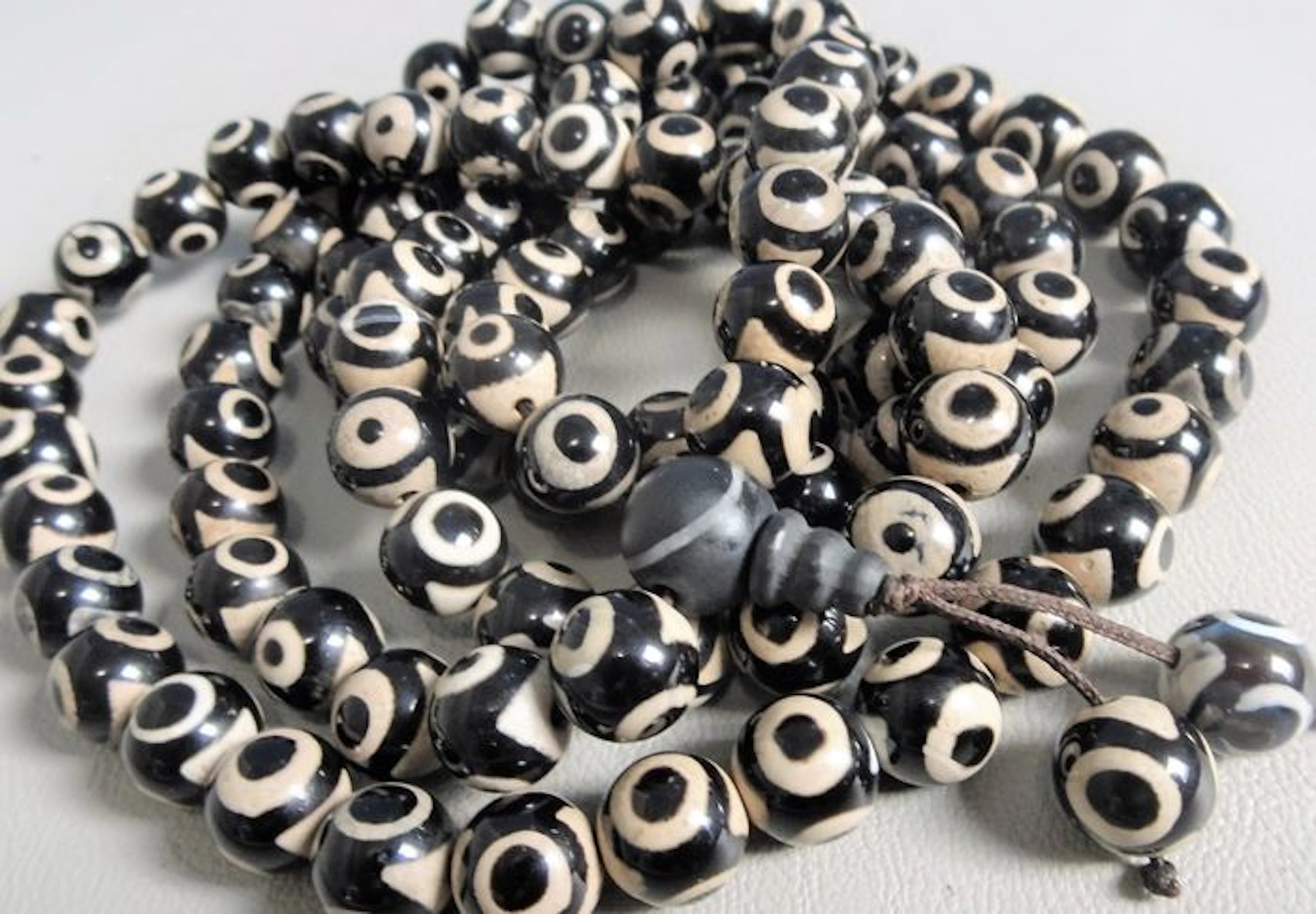 Tibetan prayer necklace - 108 black onyx, 3 eyes, dzi beads.