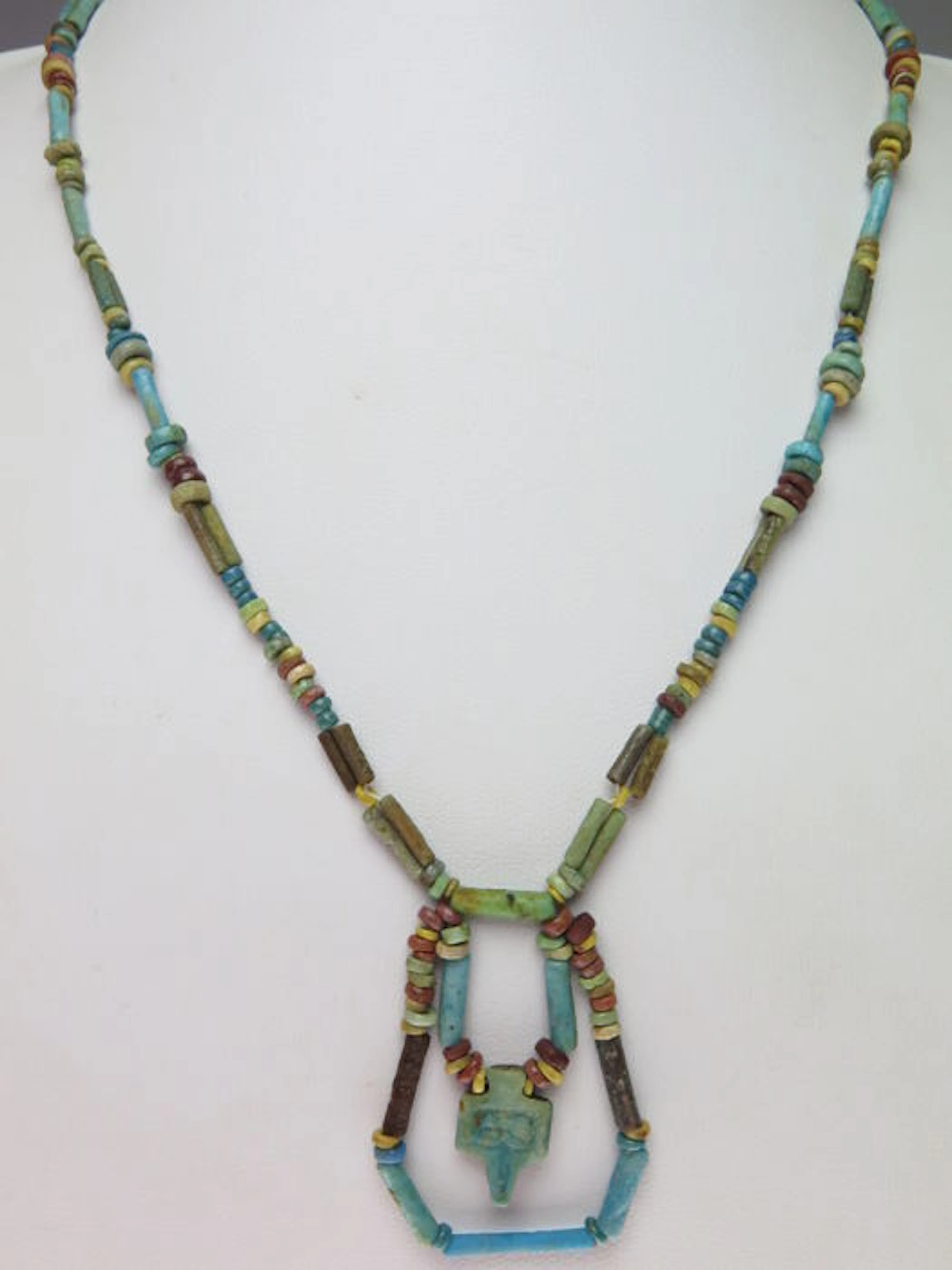 Egyptian necklace of faience beads and decorated amulet (offer plate) - 58 cm
