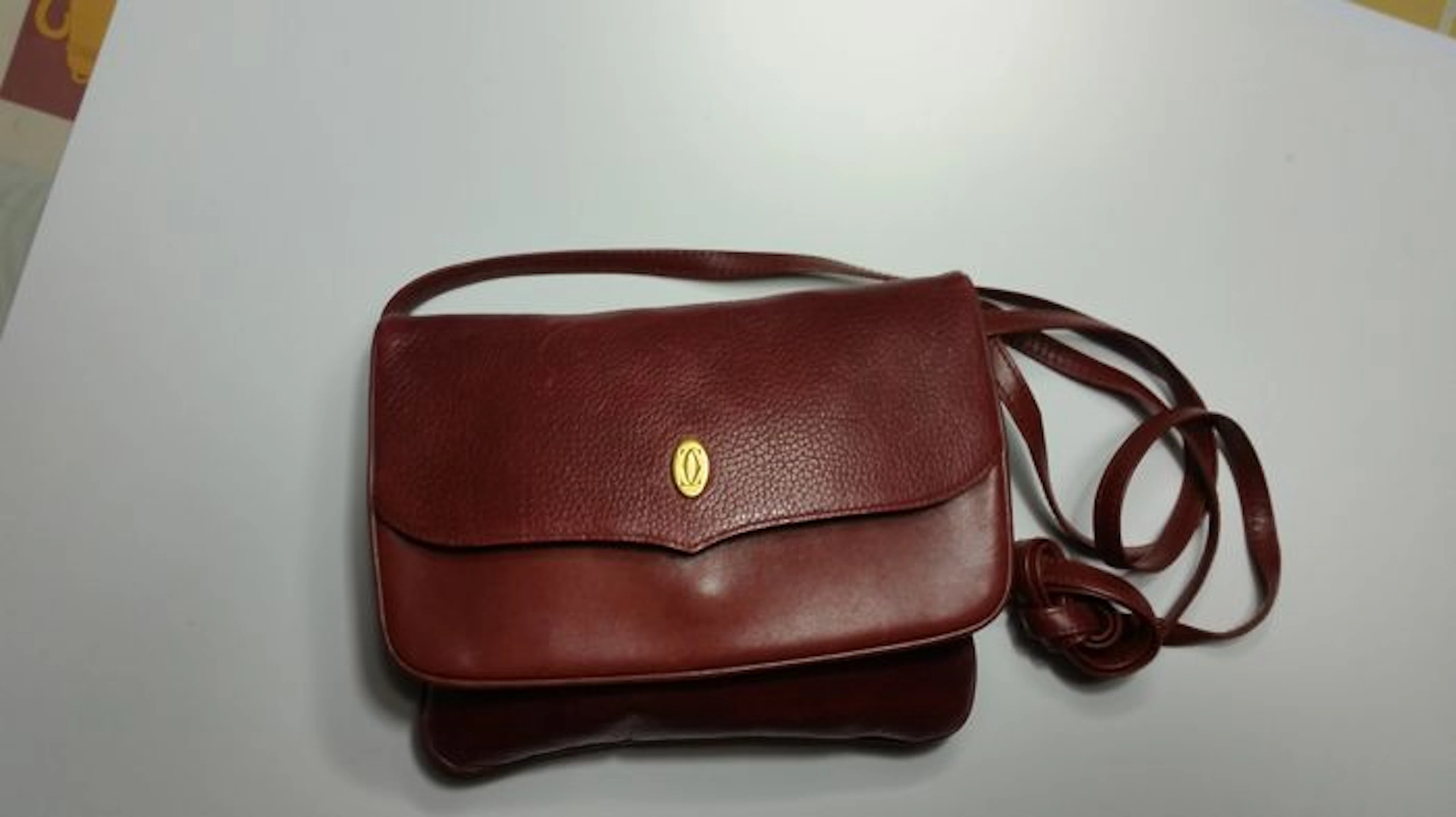 Cartier vintage maroon leather handbag