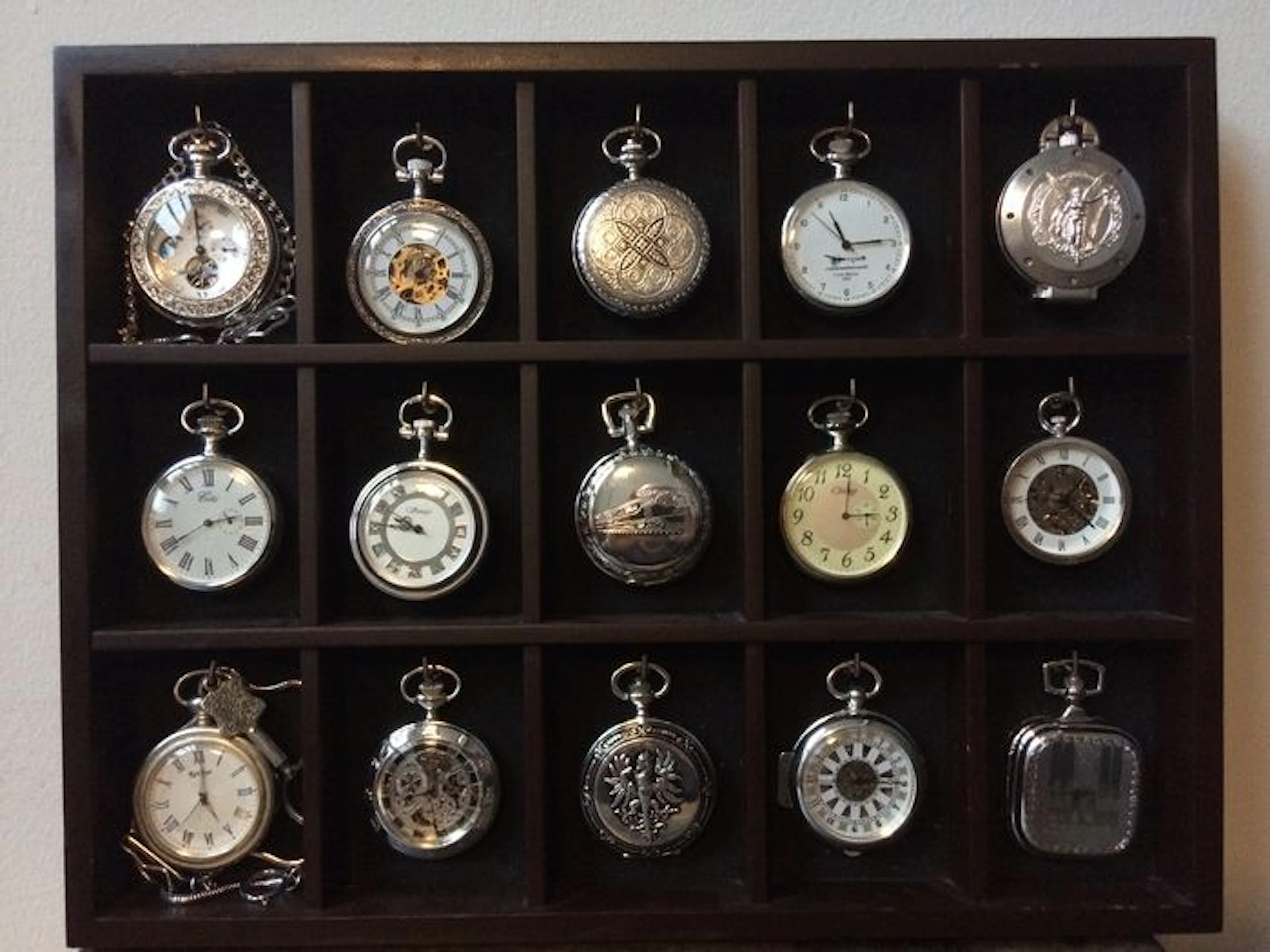 Collection of 15 silver plated mechanical pocket watches in luxury