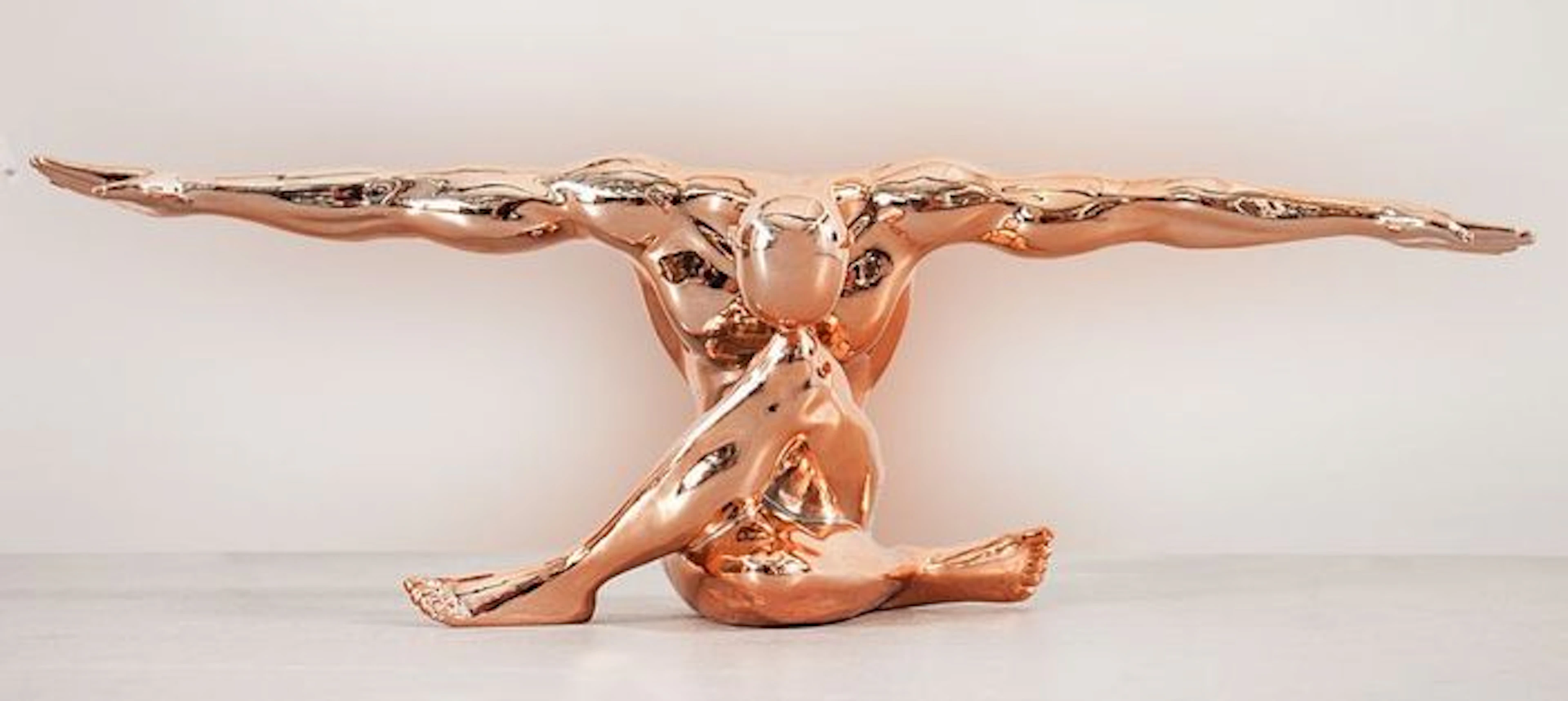 Figure of a sportsman holding a pose