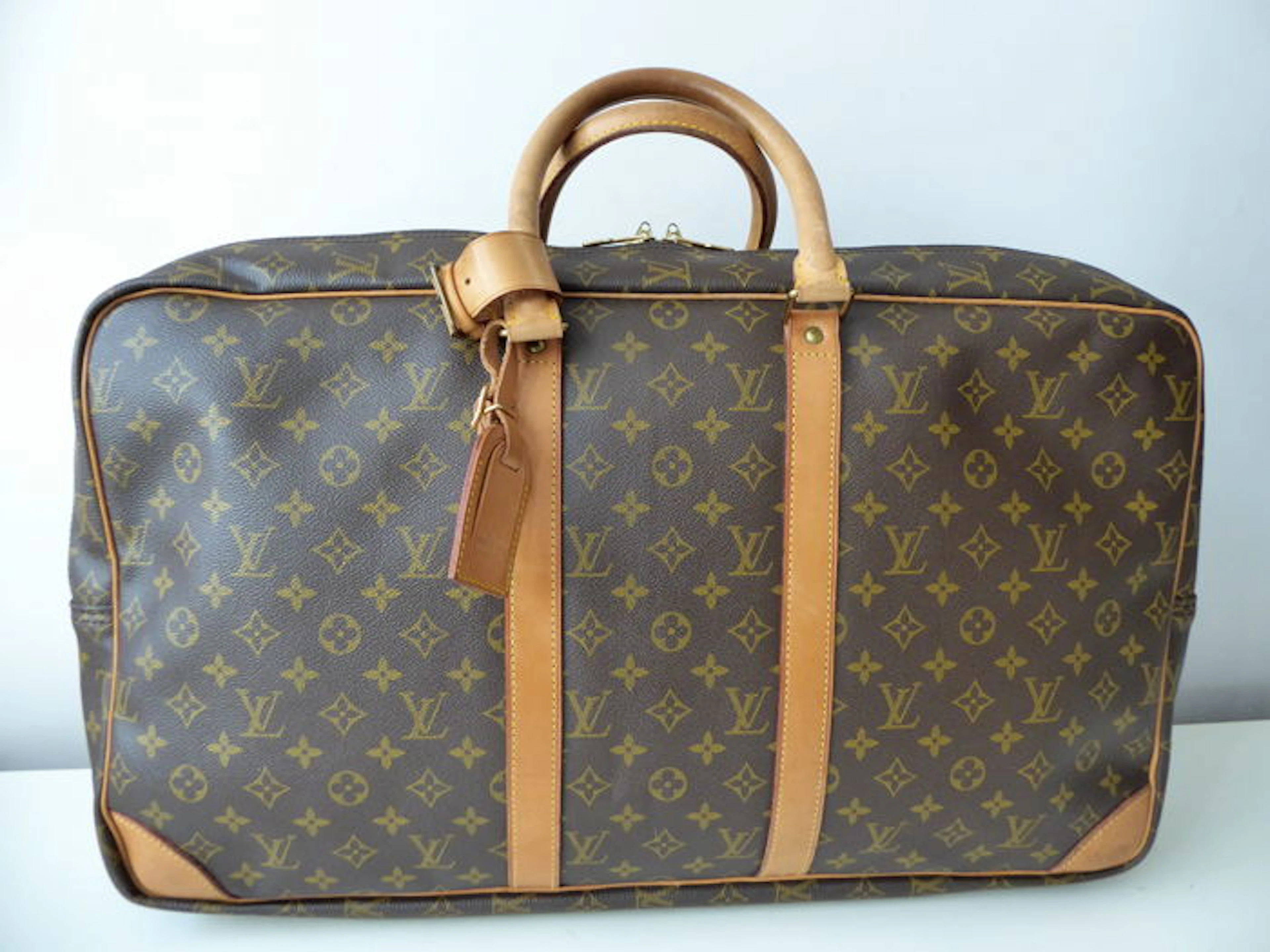 Louis Vuitton - Sirius 55 - with double compartments