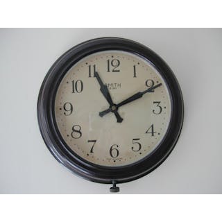A WW2 Smiths military issued Bakelite wall clock, dated 1944
