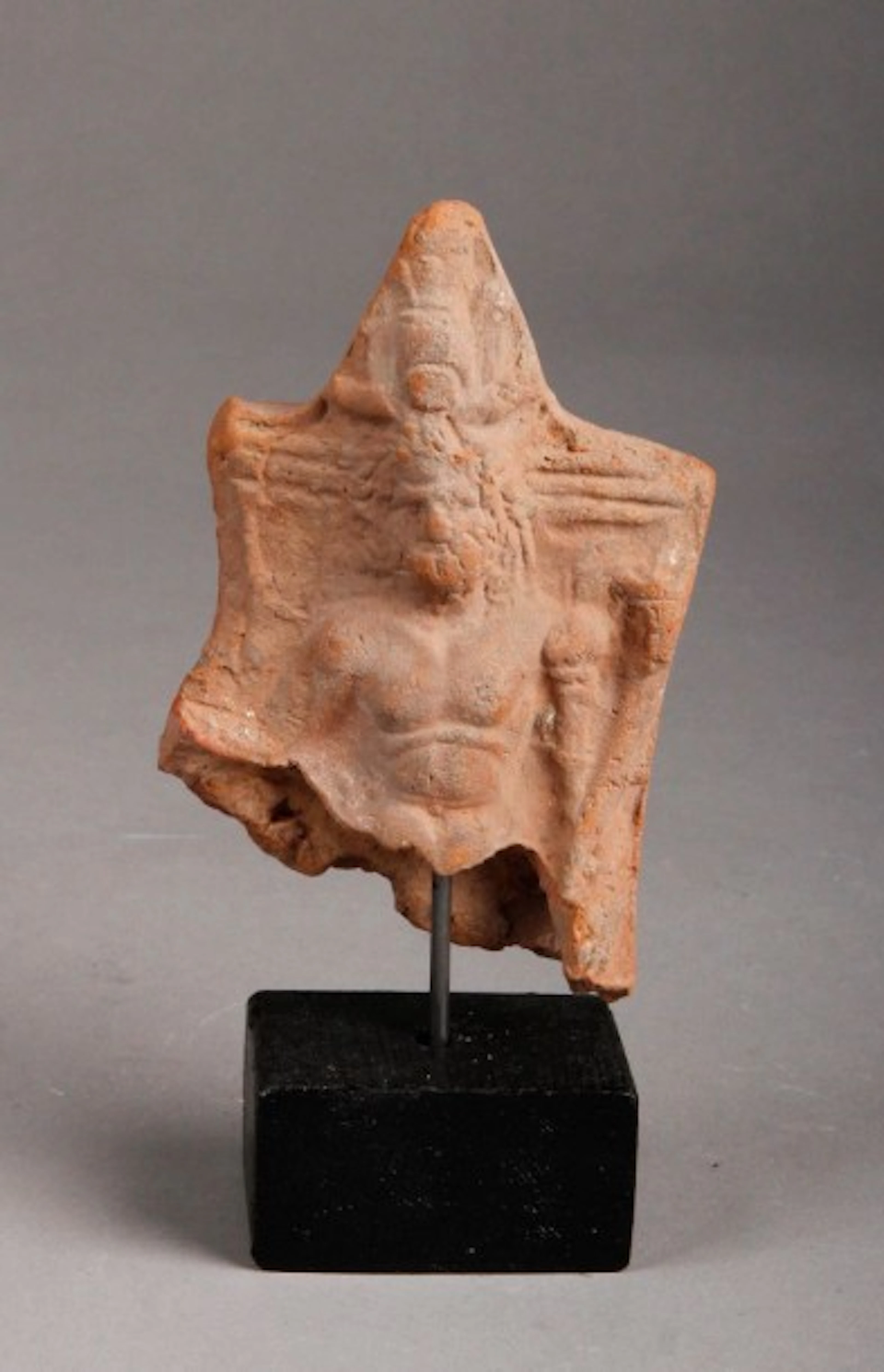 Fragment d'une statuette en terre