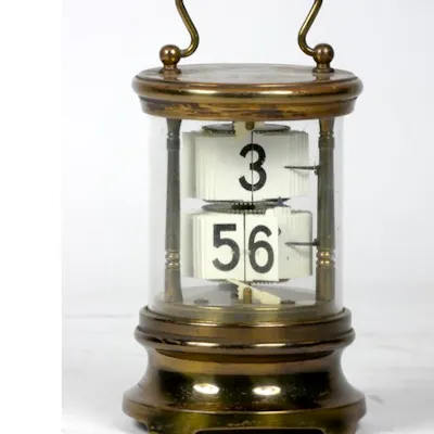 A U.S.A 'Ever-Ready' ticket desk clock, the brass case of cy... | Barnebys