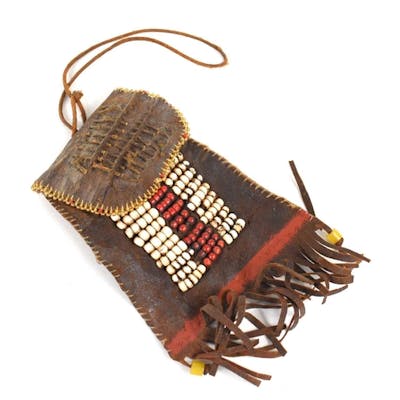 A small Native American hide pouch with beaded decoration an... | Barnebys