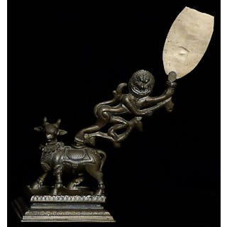 Very unusual bronze lion on cow. Loss of top of object