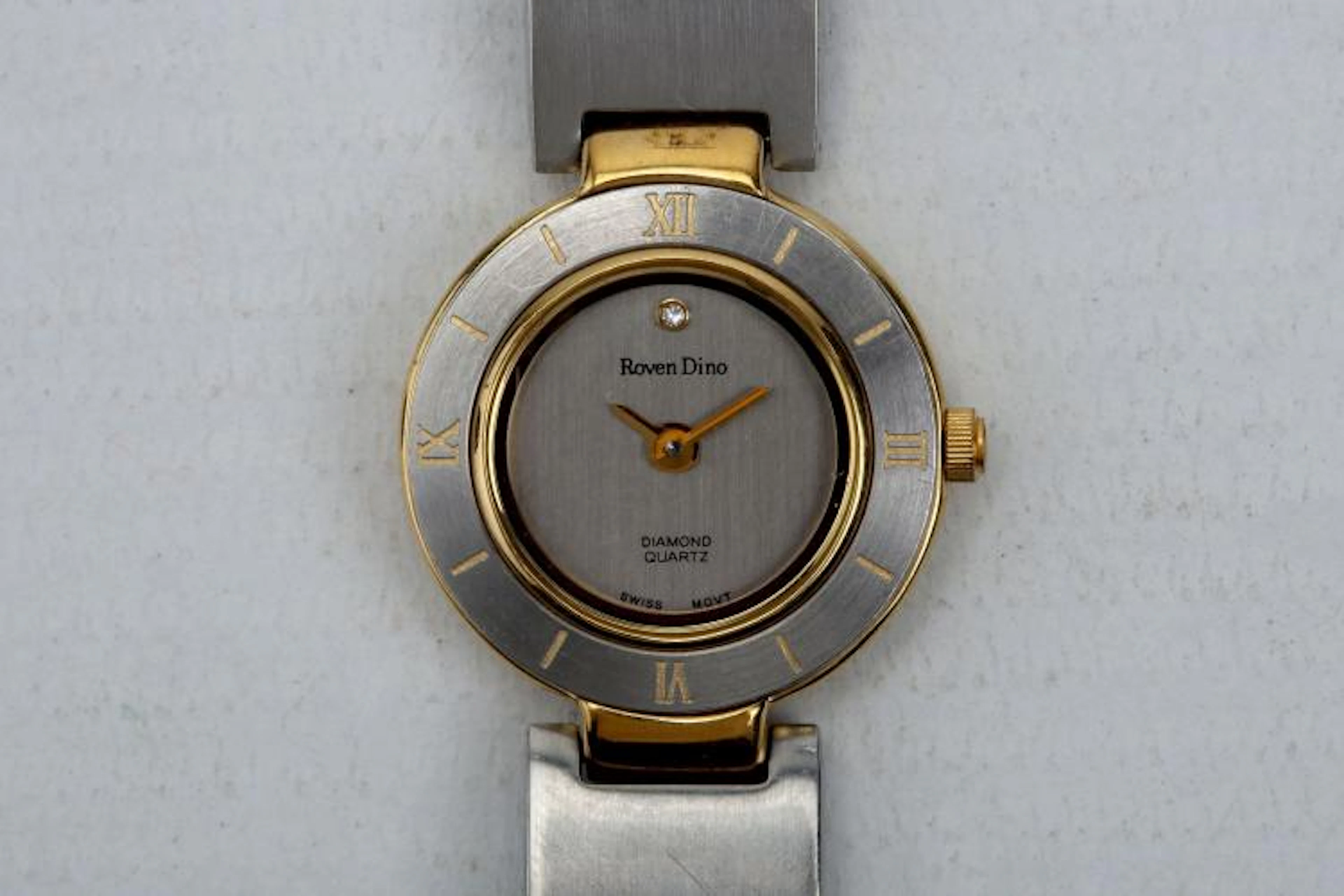 ROVEN DINO WRISTWATCH, stainless steel and gold plated