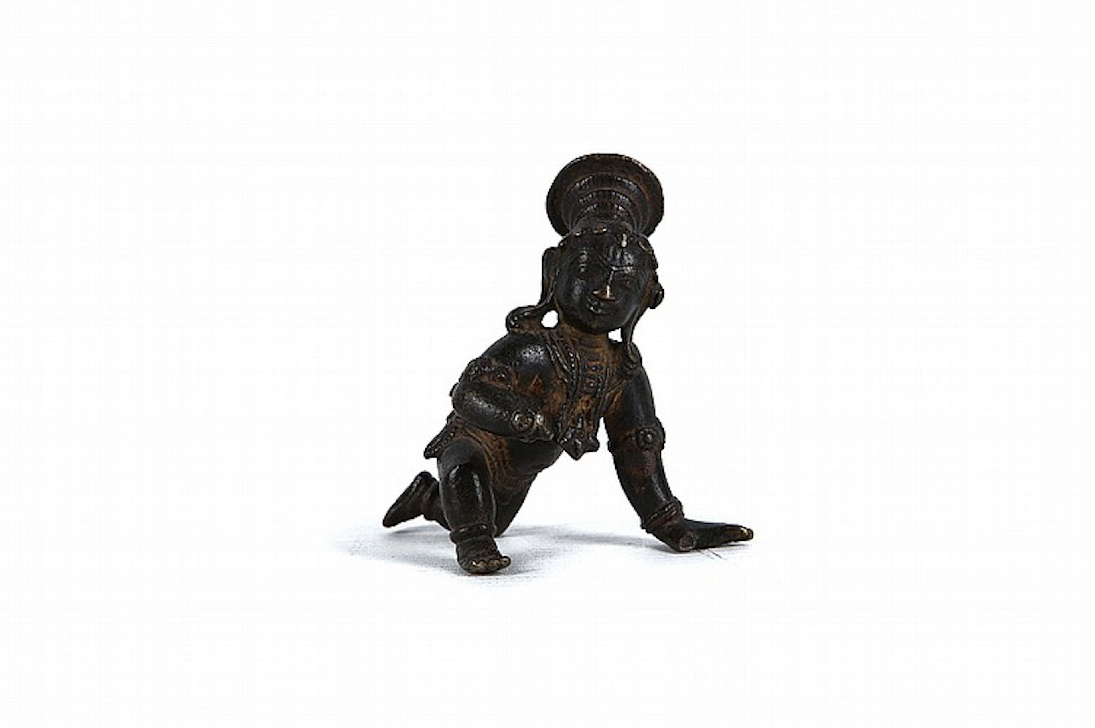 AN INDIAN BRONZE FIGURE OF BALAKRUSHNA