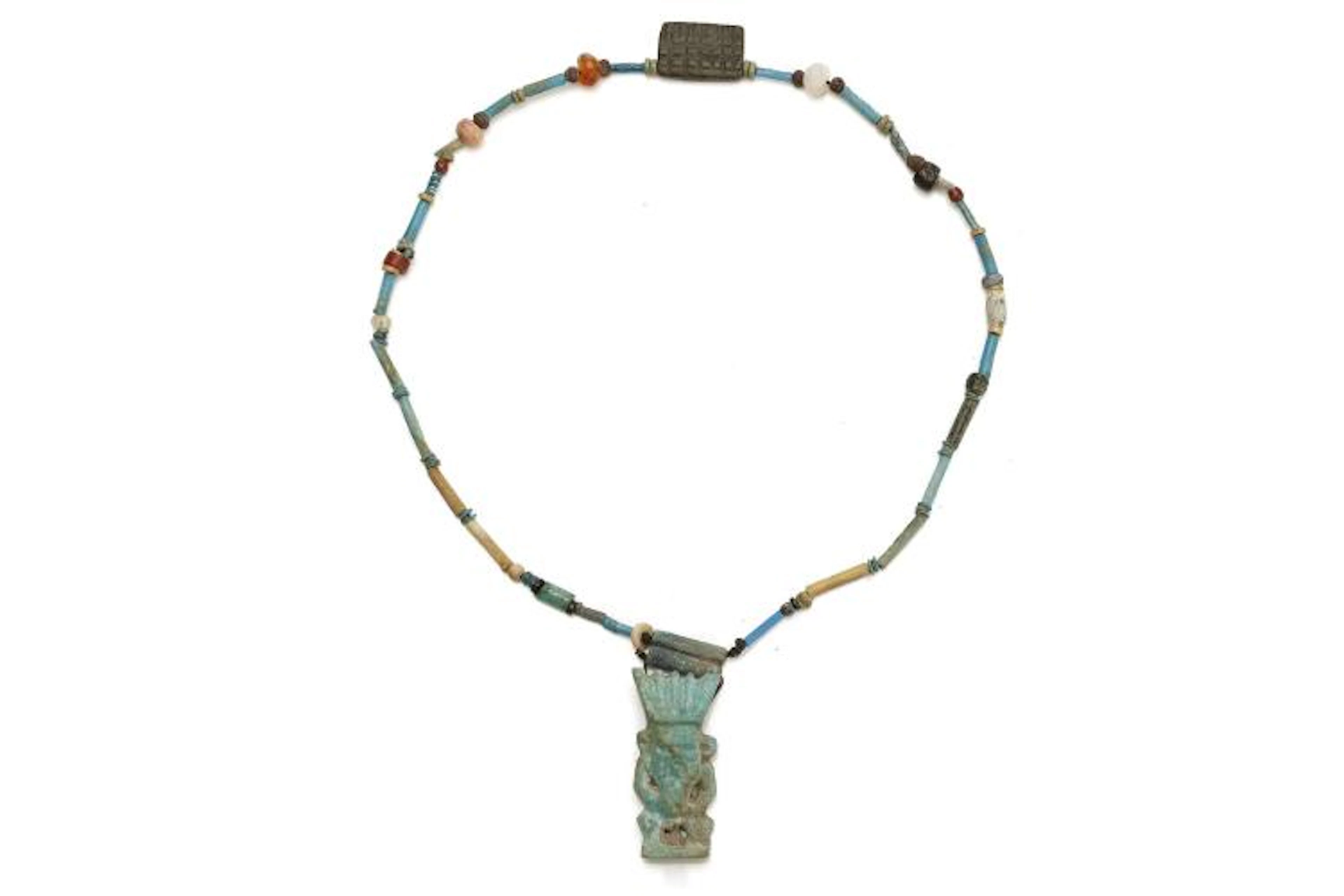 AN EGYPTIAN GLAZED COMPOSITION BES AMULET NECKLACE Late Period