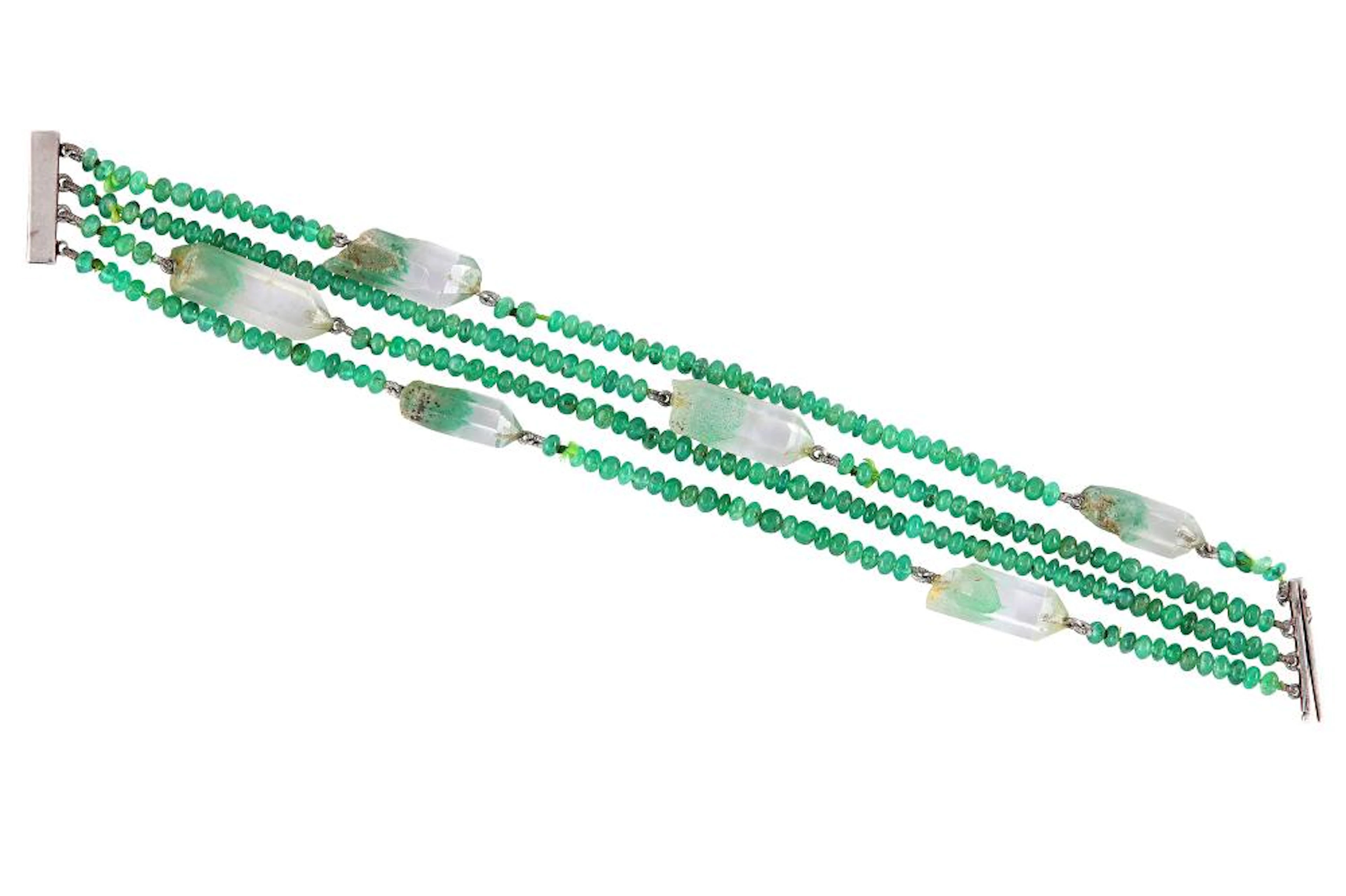 A multi-strand emerald and rock crystal bracelet