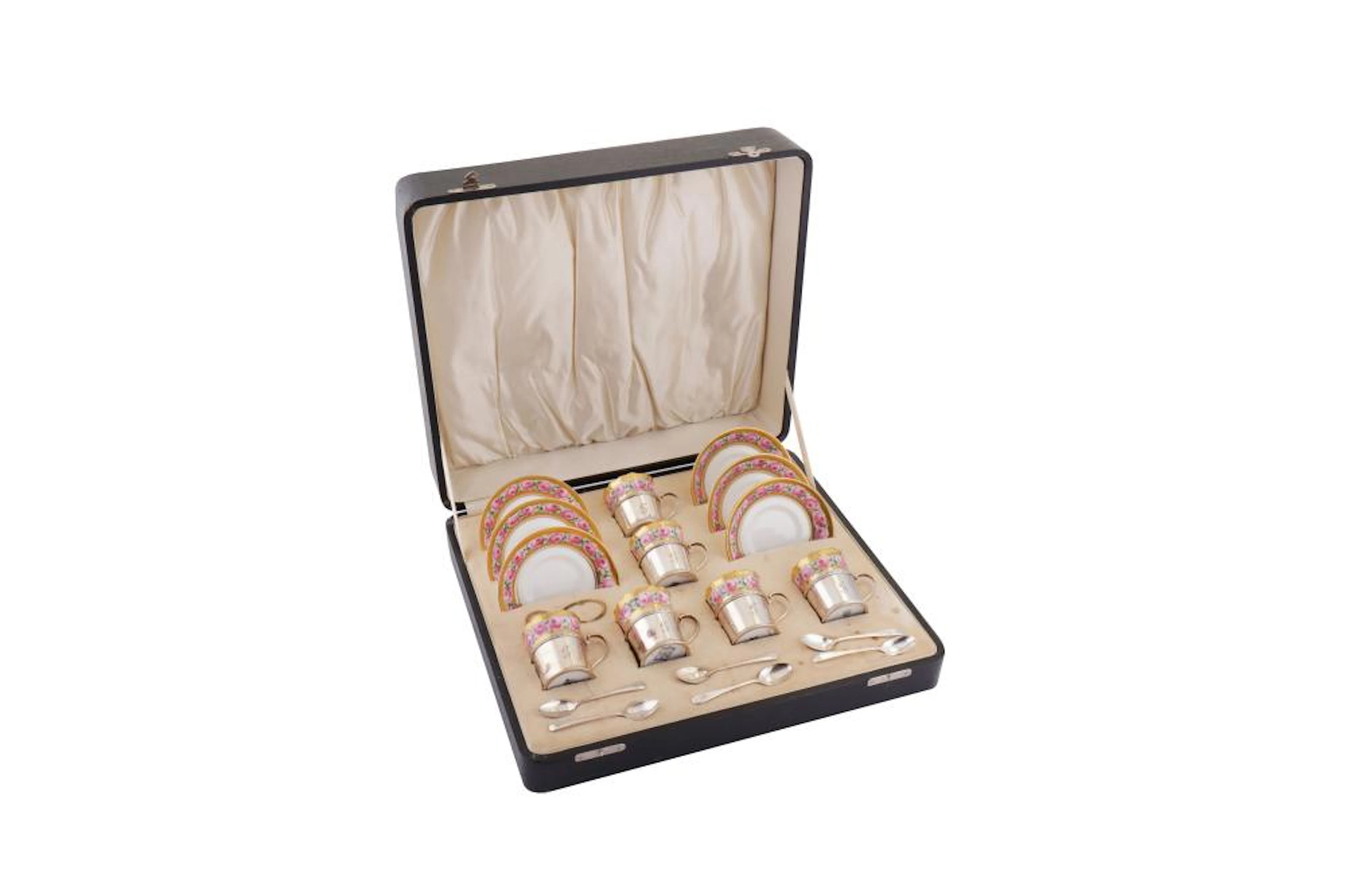 A cased George V sterling silver mounted Paragon demitasse coffee set