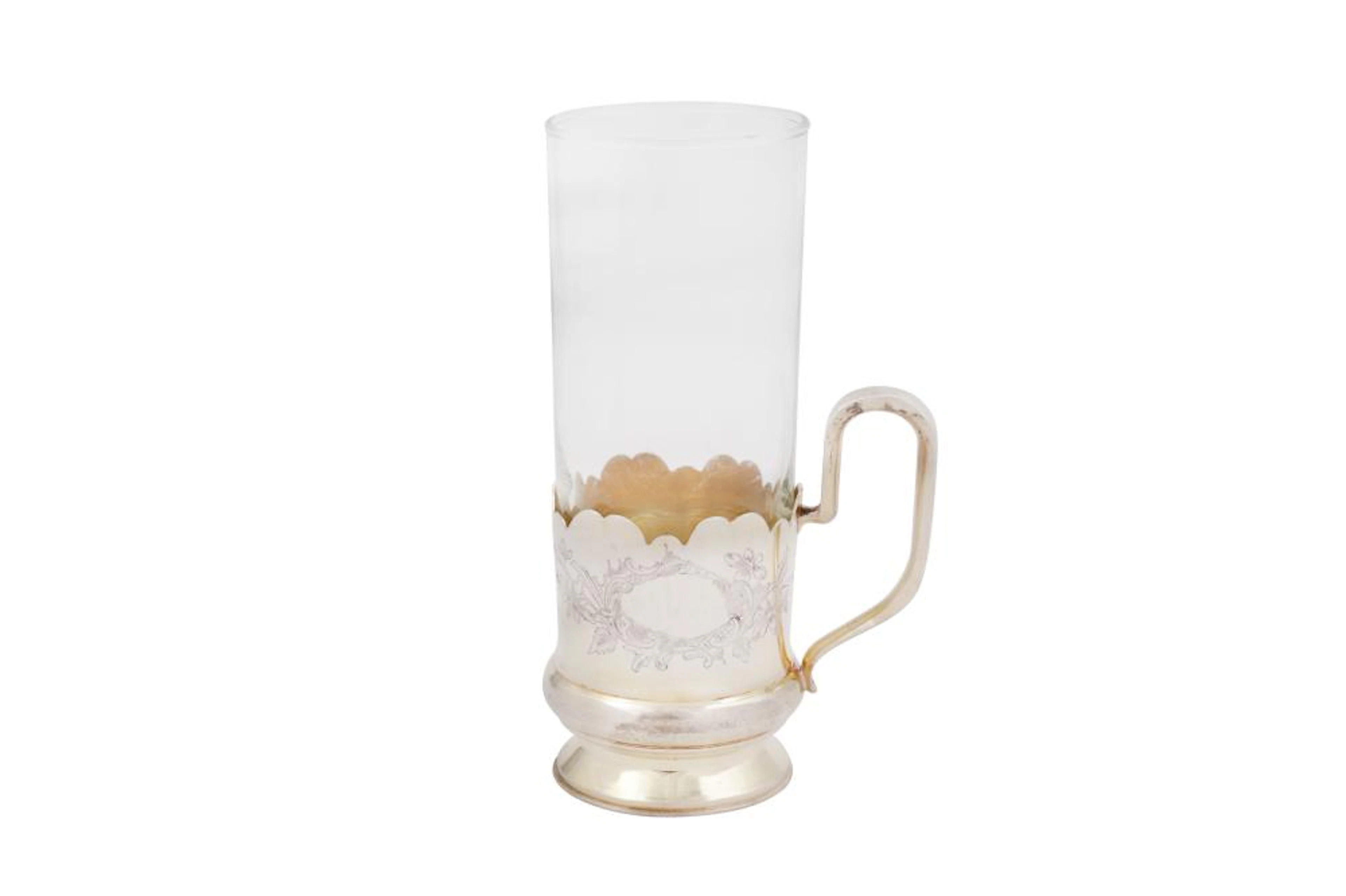 A Nicolas II Russian 84 zolotnik silver gilt tea glass holder (podstakannik)