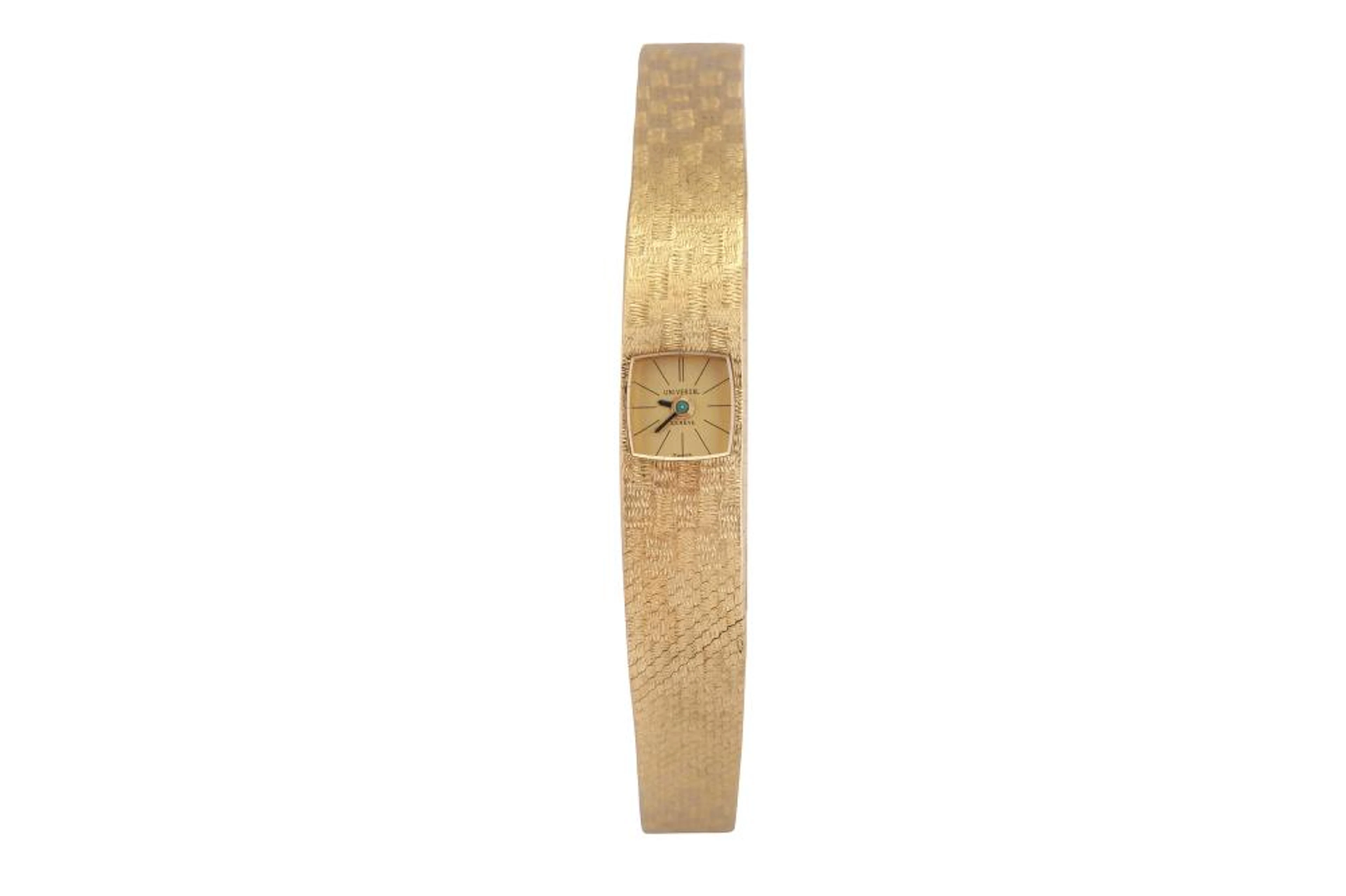 UNIVERSAL GENEVE. 18K YELLOW GOLD.
