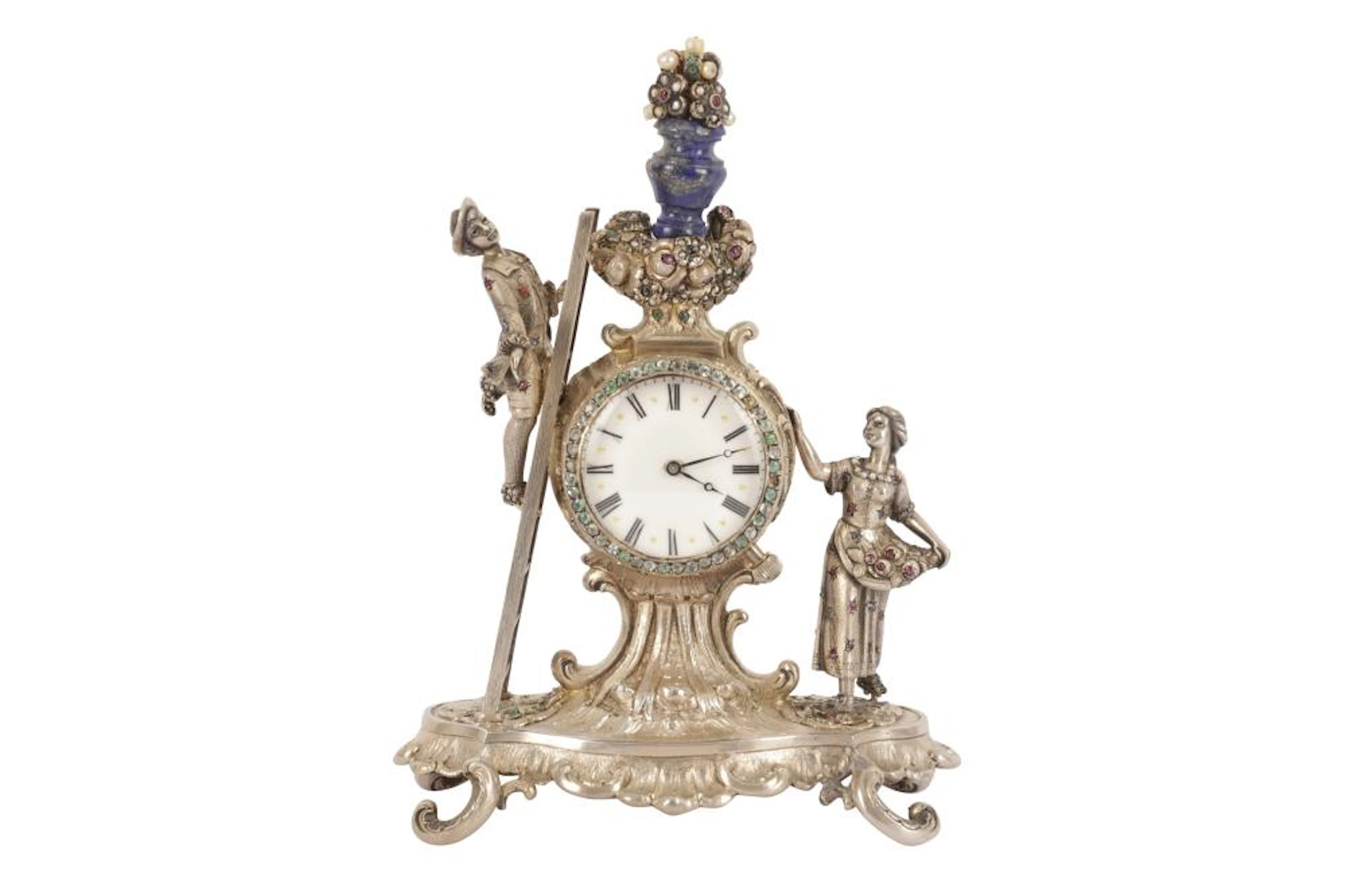 AN AUSTRIAN SILVER GILT MANTEL CLOCK