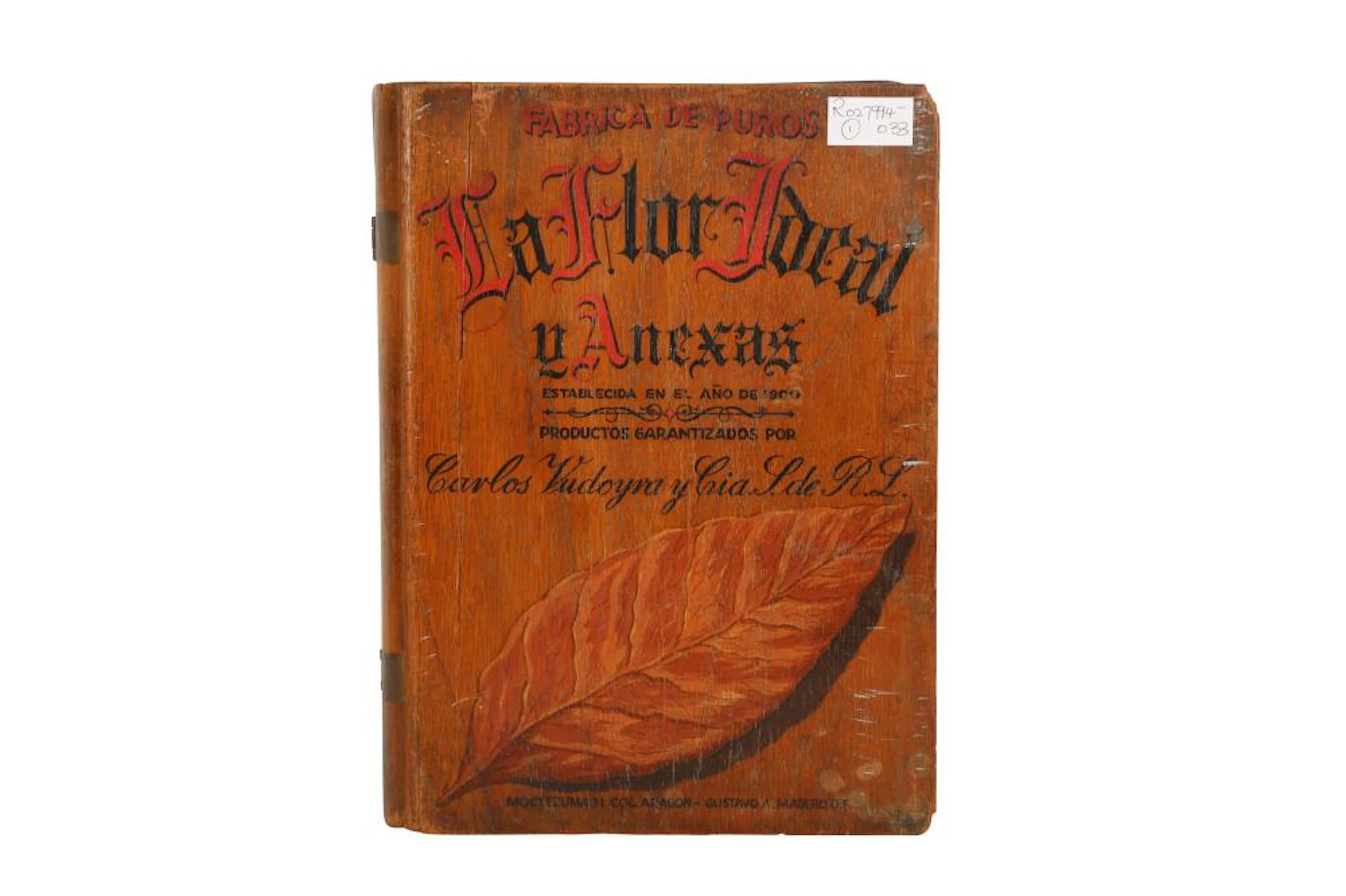 A CEDAR CIGAR BOX IN THE FORM OF A BOOK