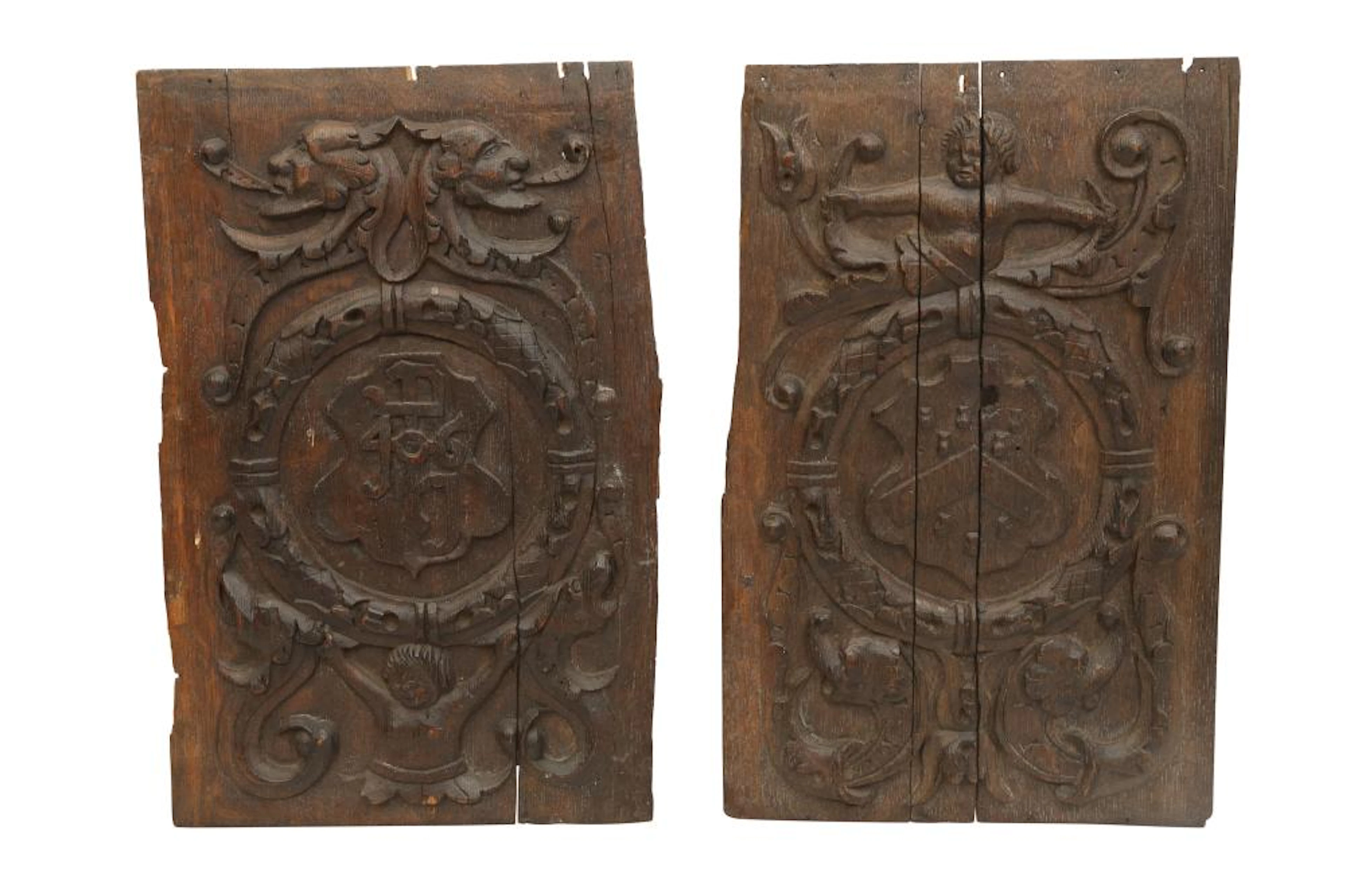 TWO 16TH CENTURY CARVED OAK PANELS,