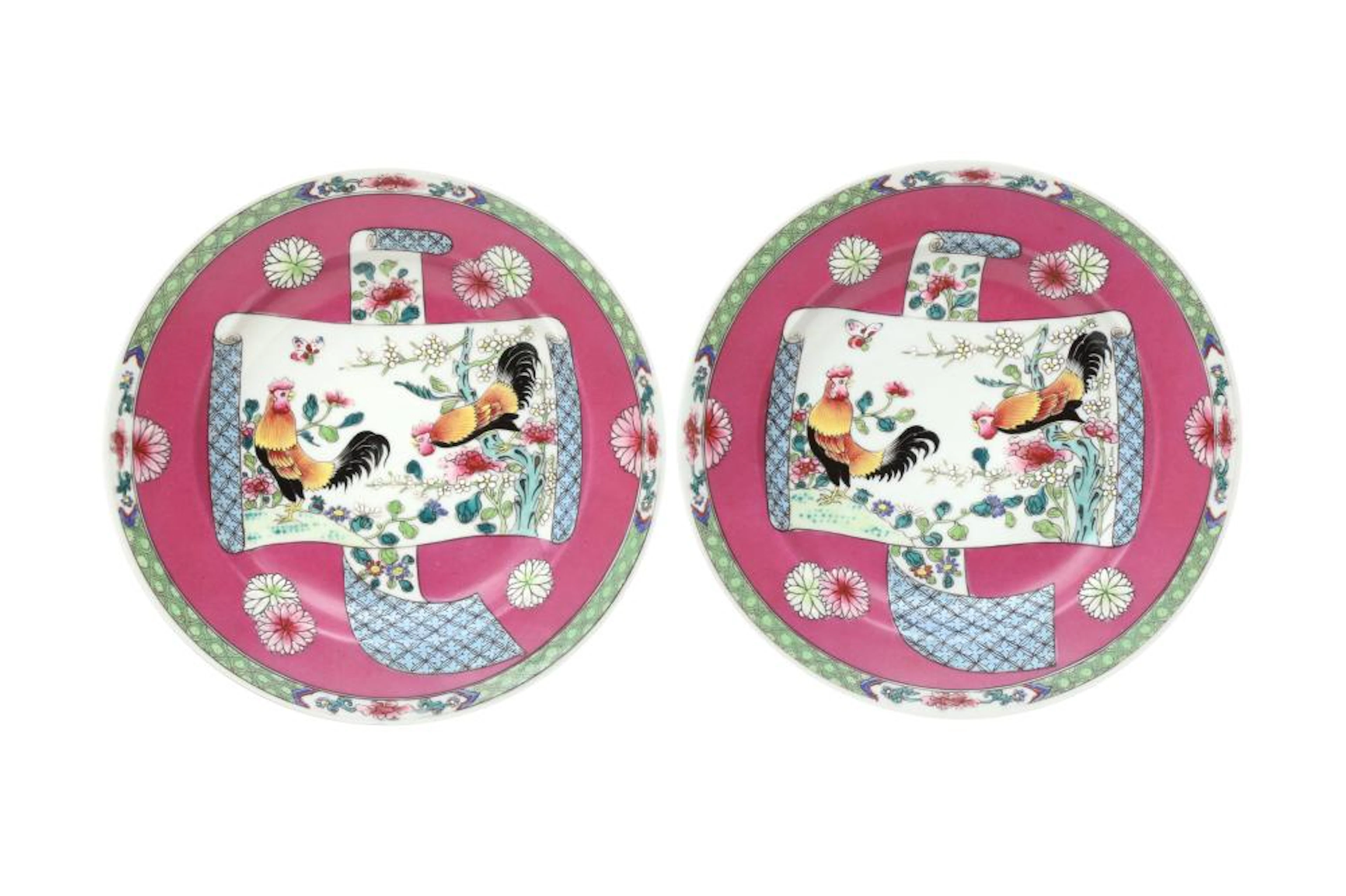 A PAIR OF CHINESE FAMILLE ROSE RUBY-GROUND 'COCKERELS' DISHES.