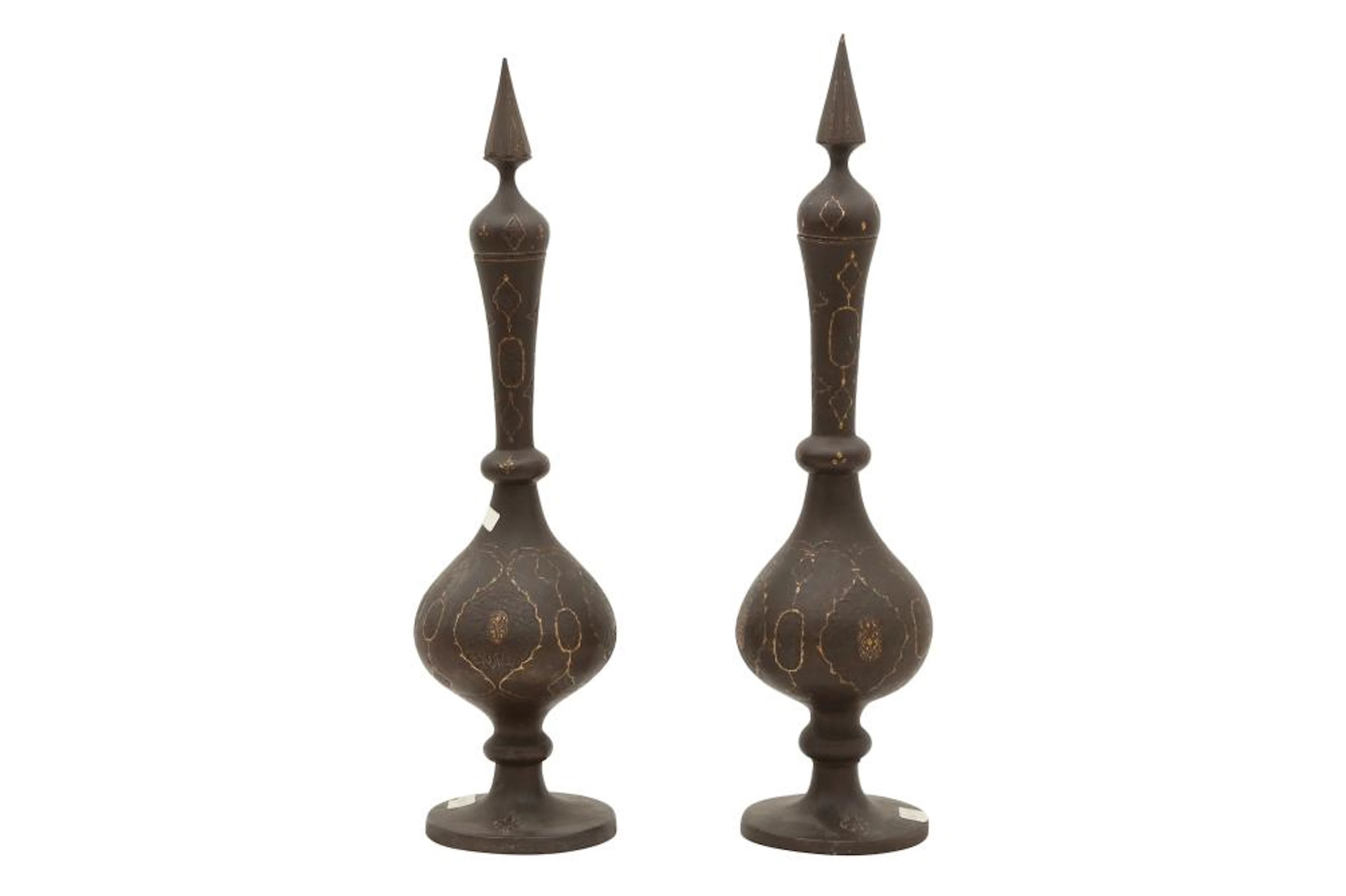 A NEAR PAIR OF QAJAR GOLD-DAMASCENED STEEL BOTTLES WITH STOPPERS