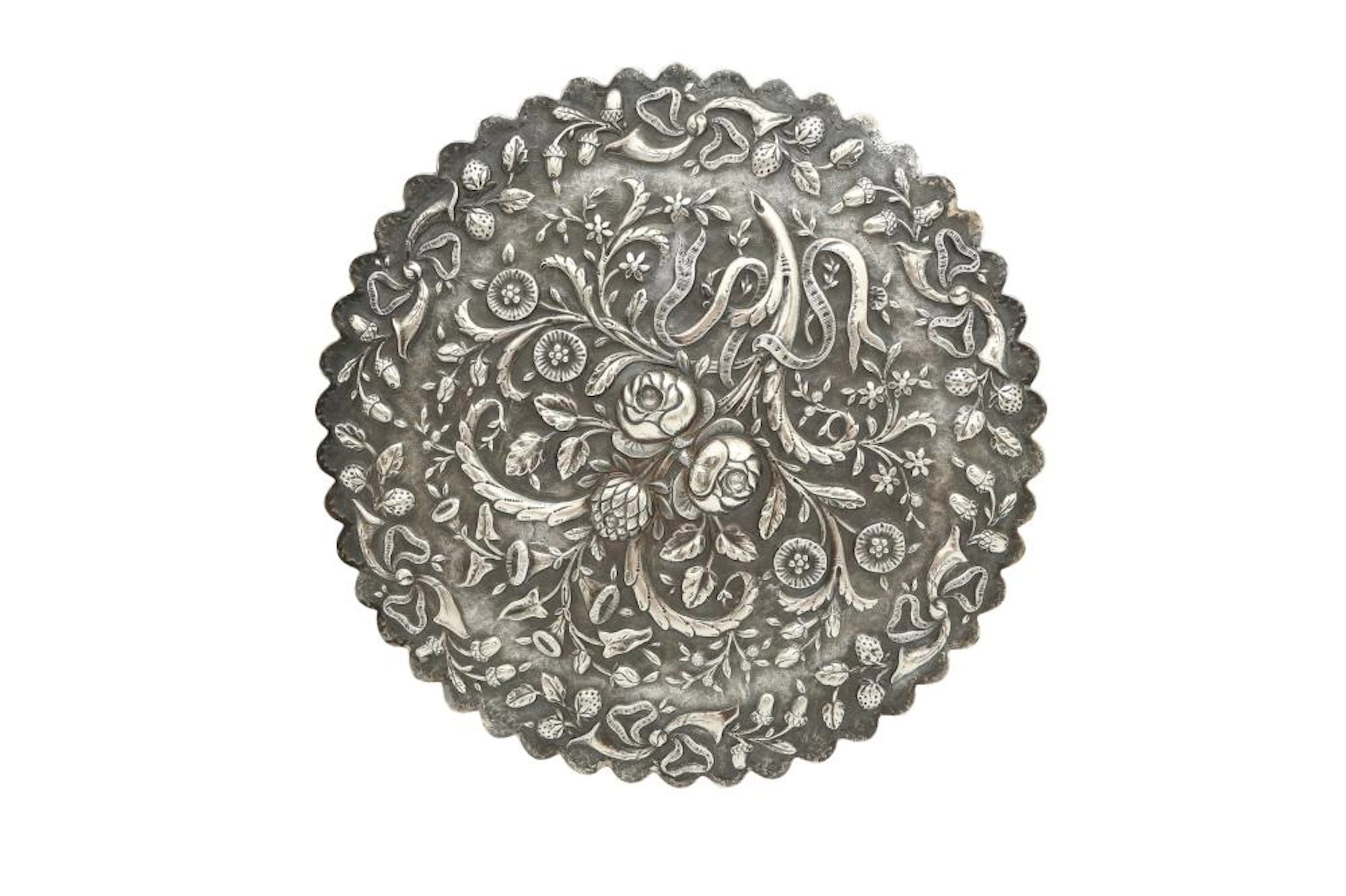 AN OTTOMAN SILVER REPOUSSÉ MIRROR FRAME