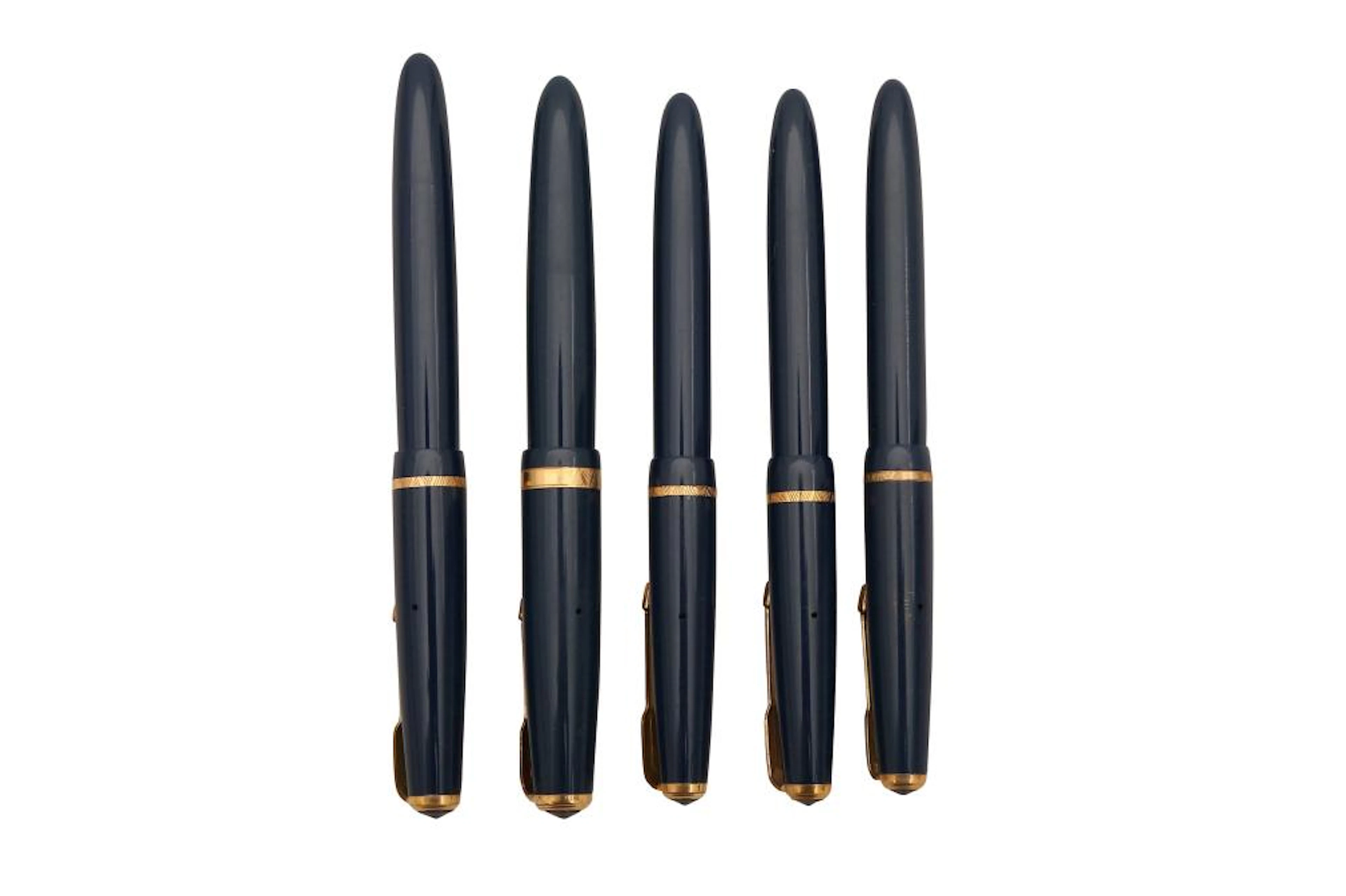 A GROUP OF FIVE BLUE PARKER FOUNTAIN PENS