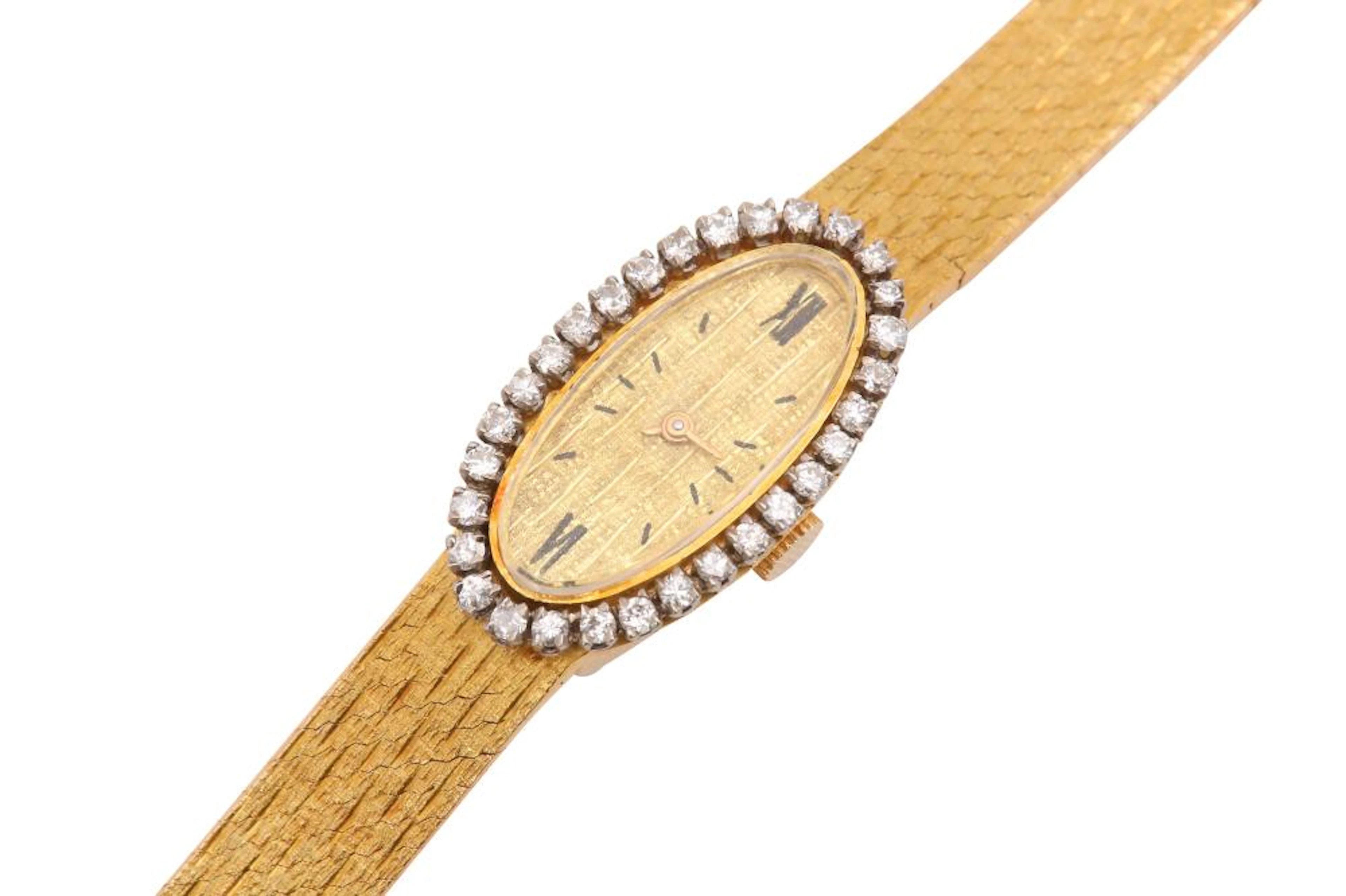 A LADIES VINTAGE 18K GLYCINE WATCH CO GOLD BRACELET WATCH