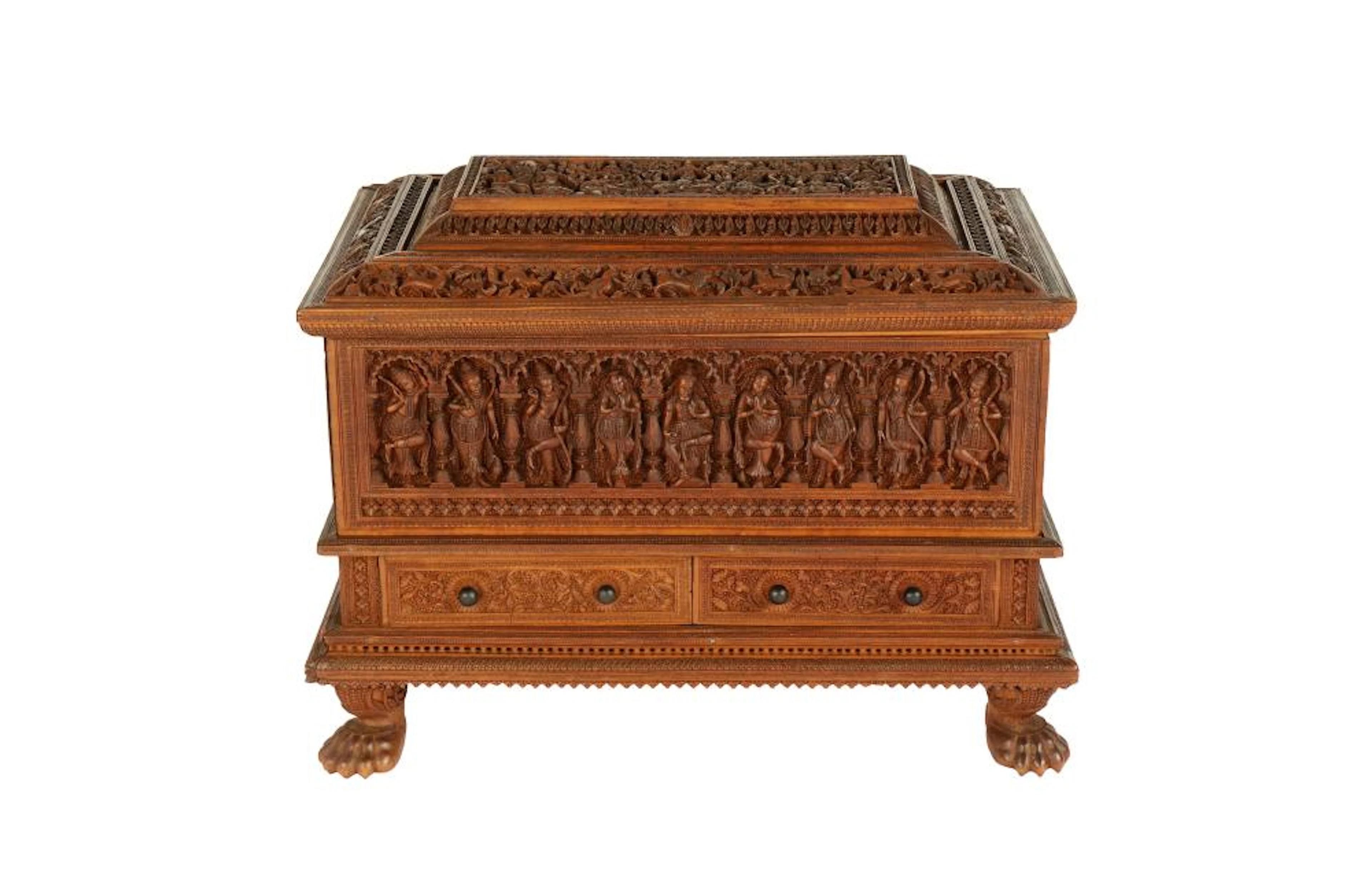 A FINELY CARVED LARGE SANDALWOOD CASKET WITH HINDU...