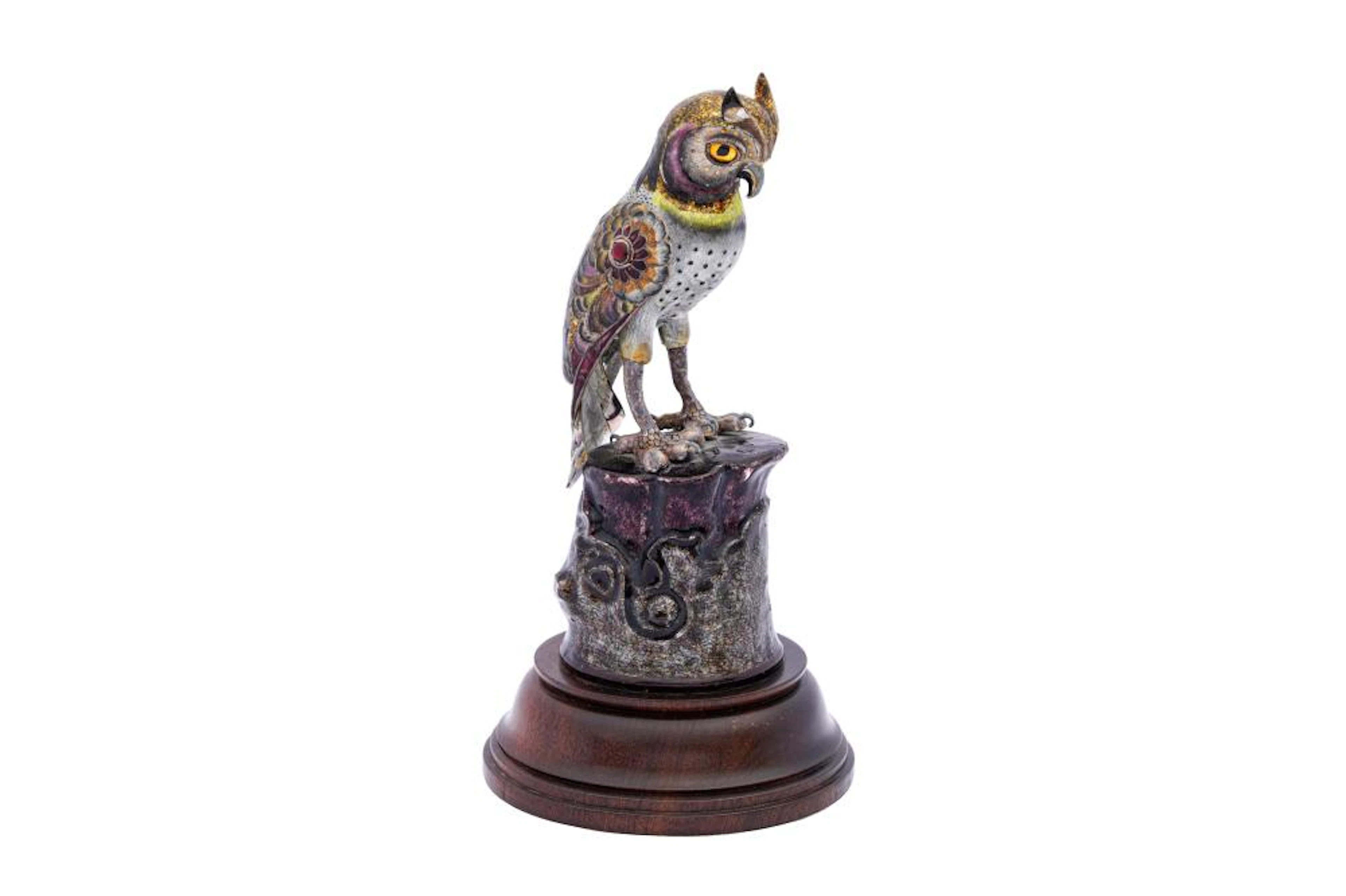 AN INDIAN POLYCHROME-ENAMELLED SILVER FIGURINE OF AN OWL Jaipur