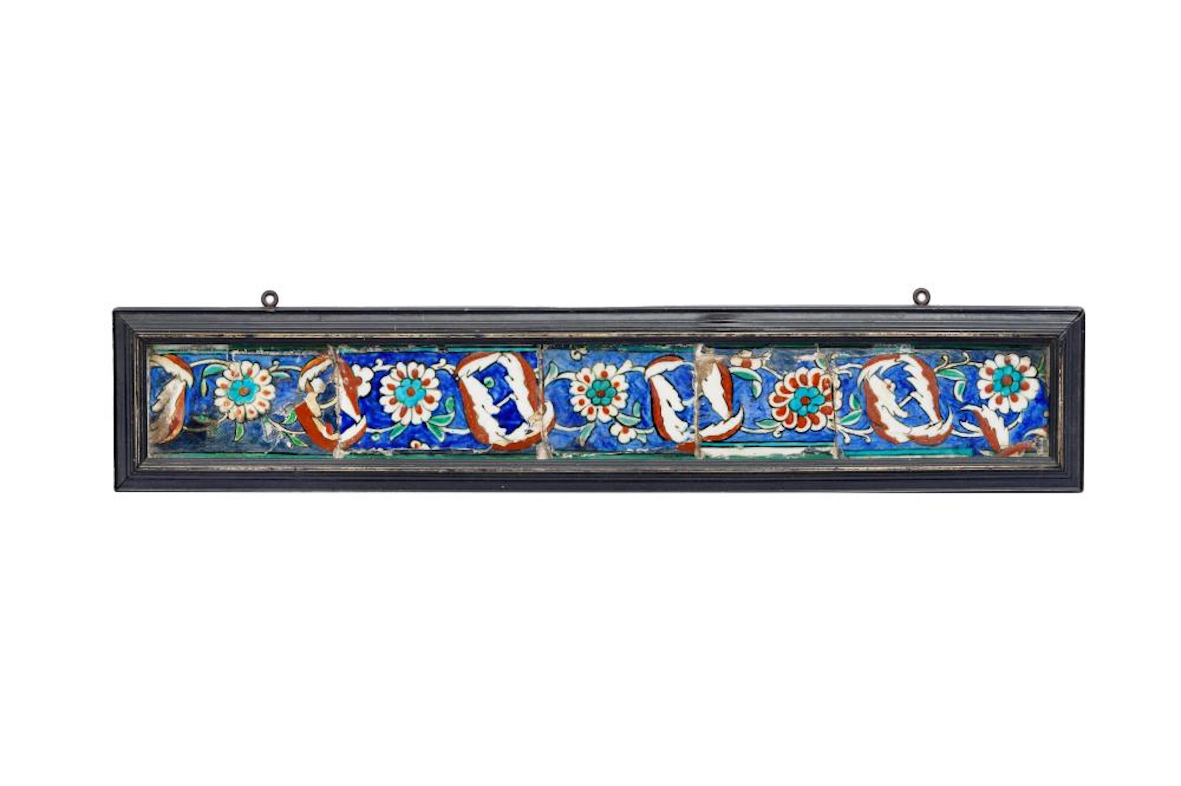 AN IZNIK POTTERY BORDER TILE PANEL Ottoman Turkey, second half 16th century